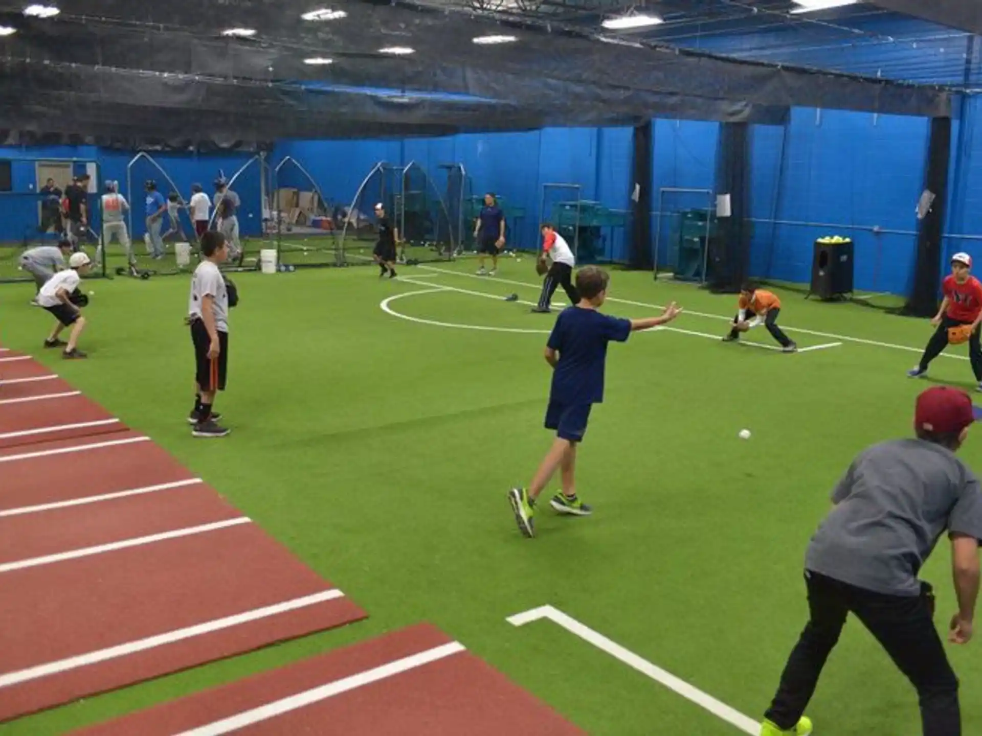 a group of people playing baseball