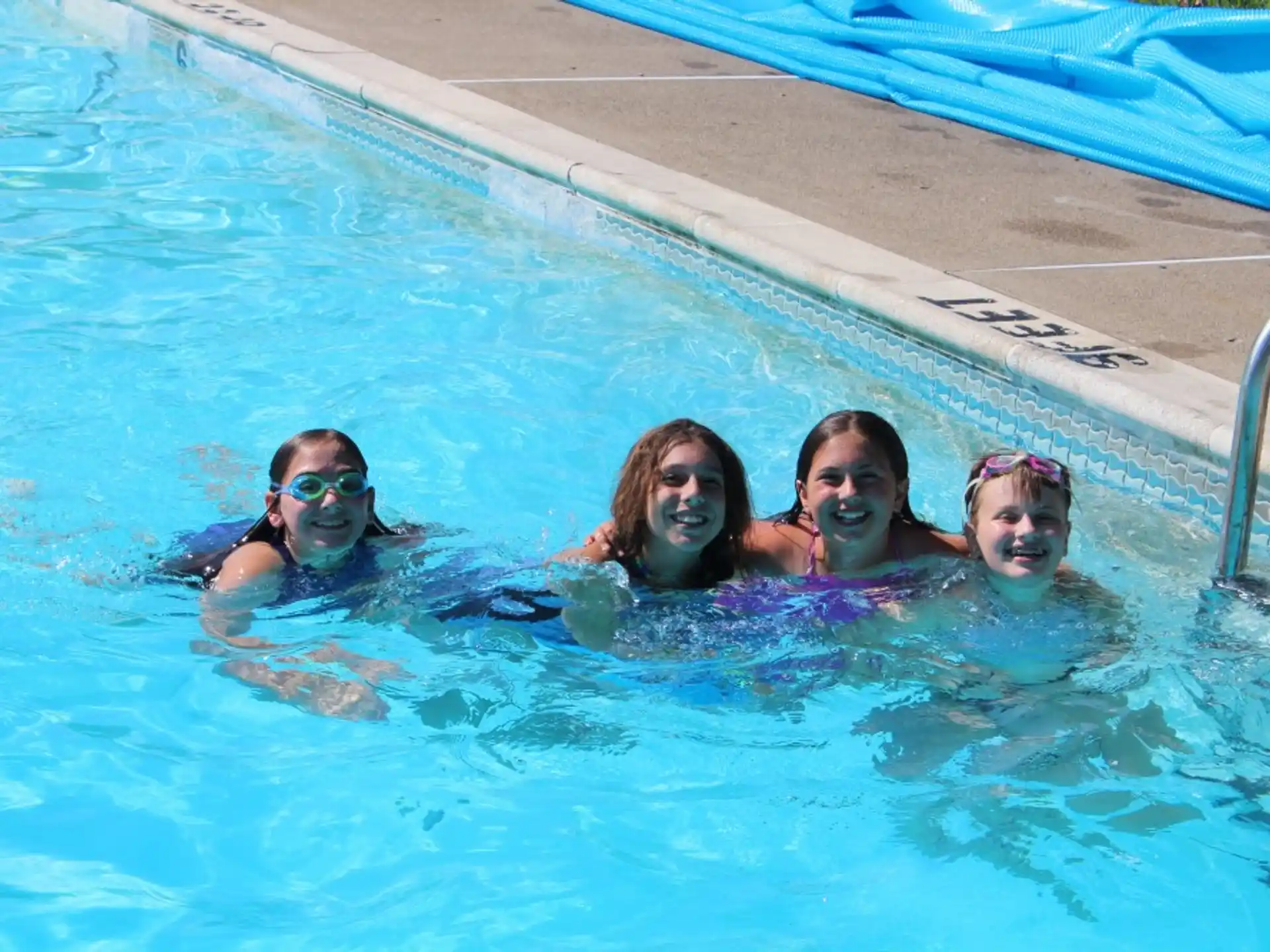 a group of people in a pool