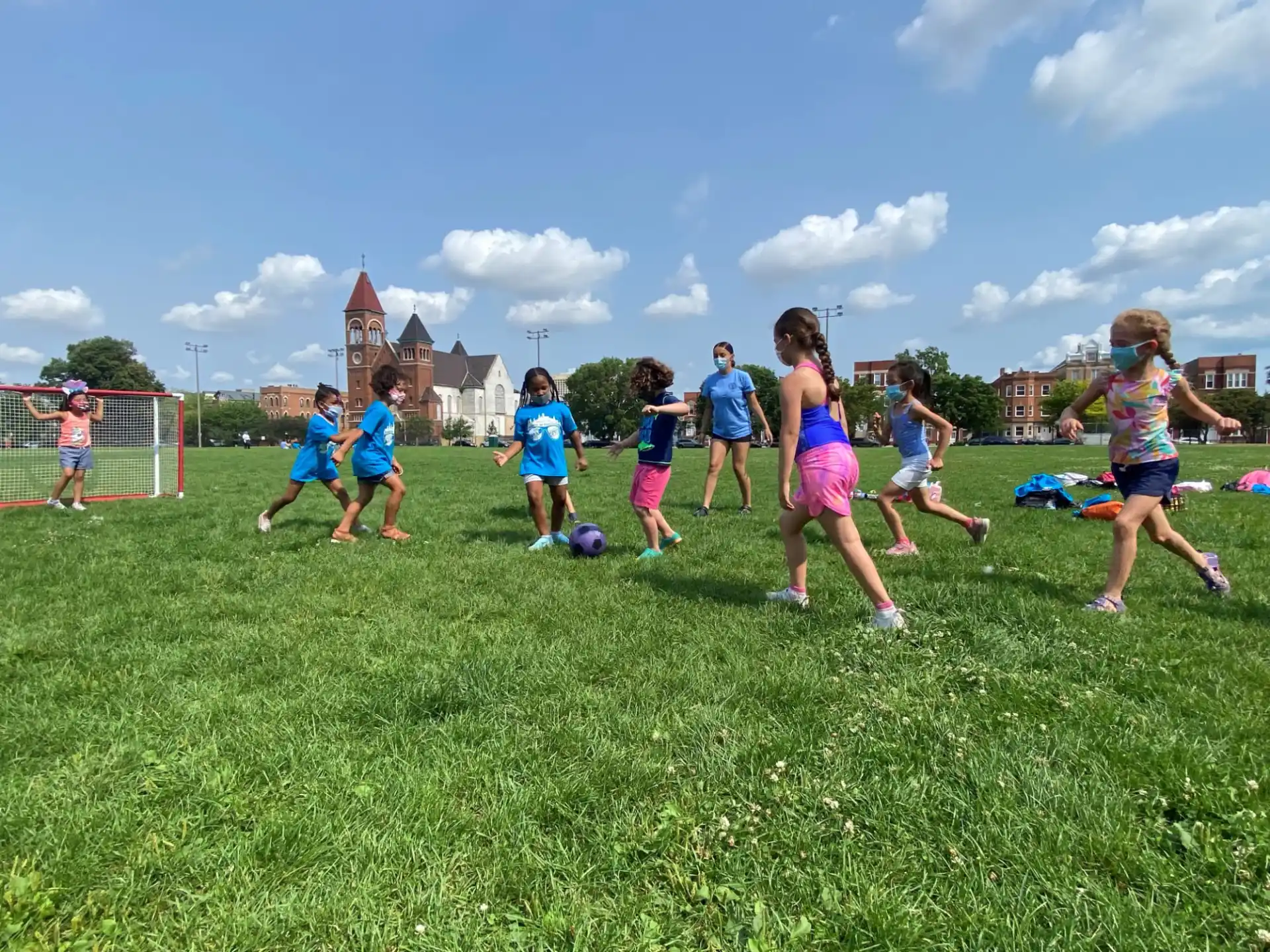 a group of people playing football