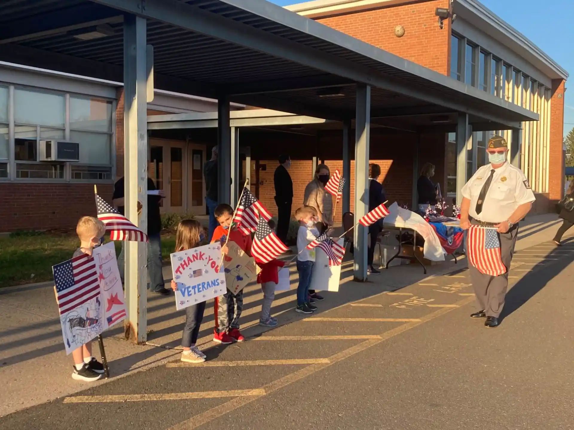 a group of people holding signs