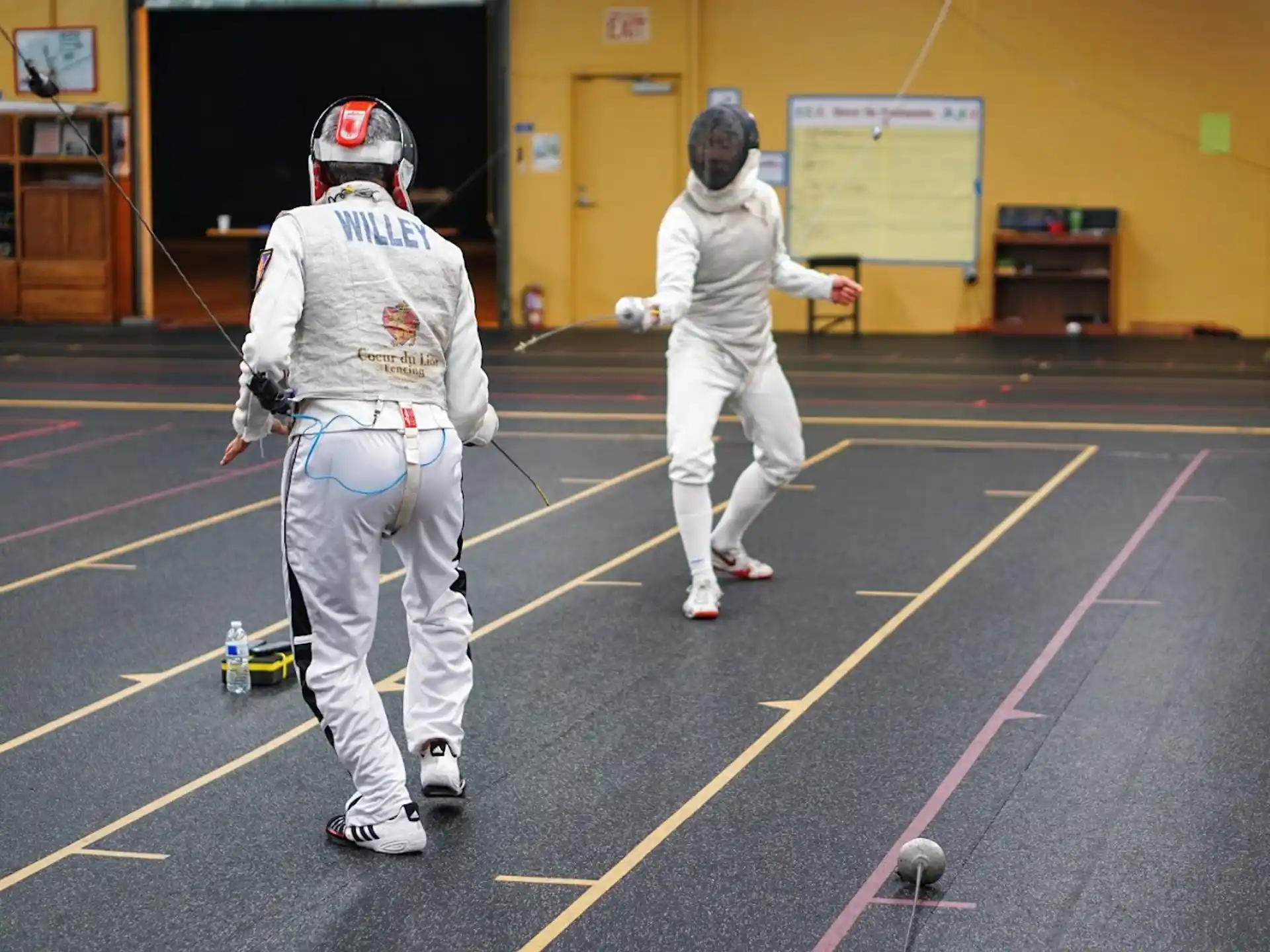 a couple of people in white uniforms