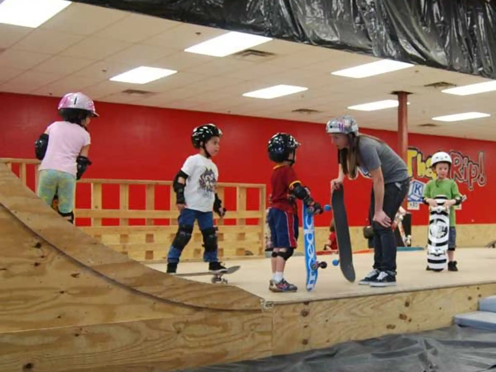 a group of kids with skateboards