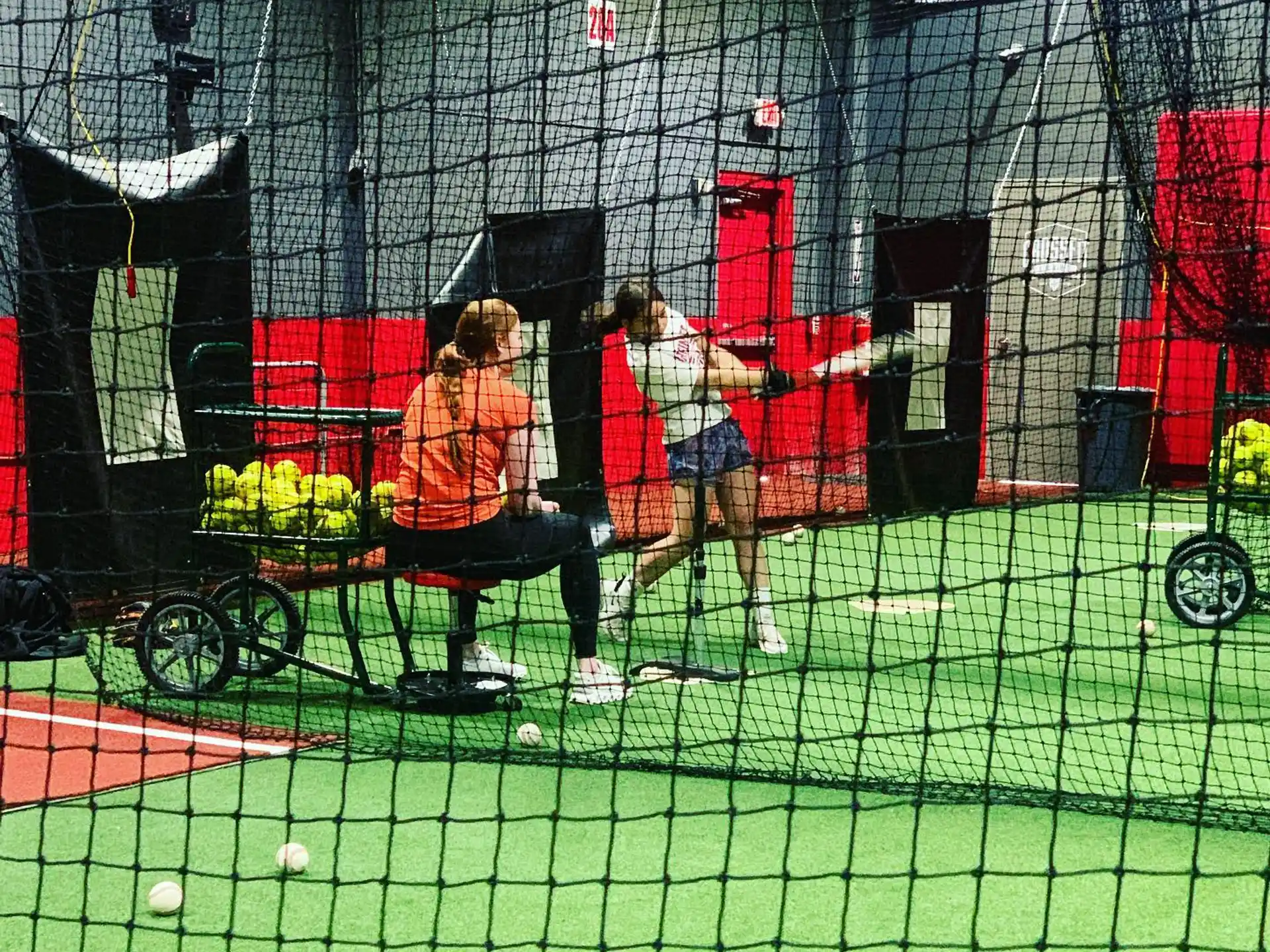 a couple of women playing tennis