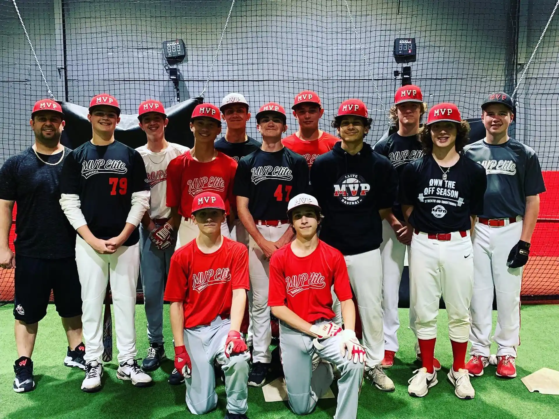 a group of baseball players posing for a photo