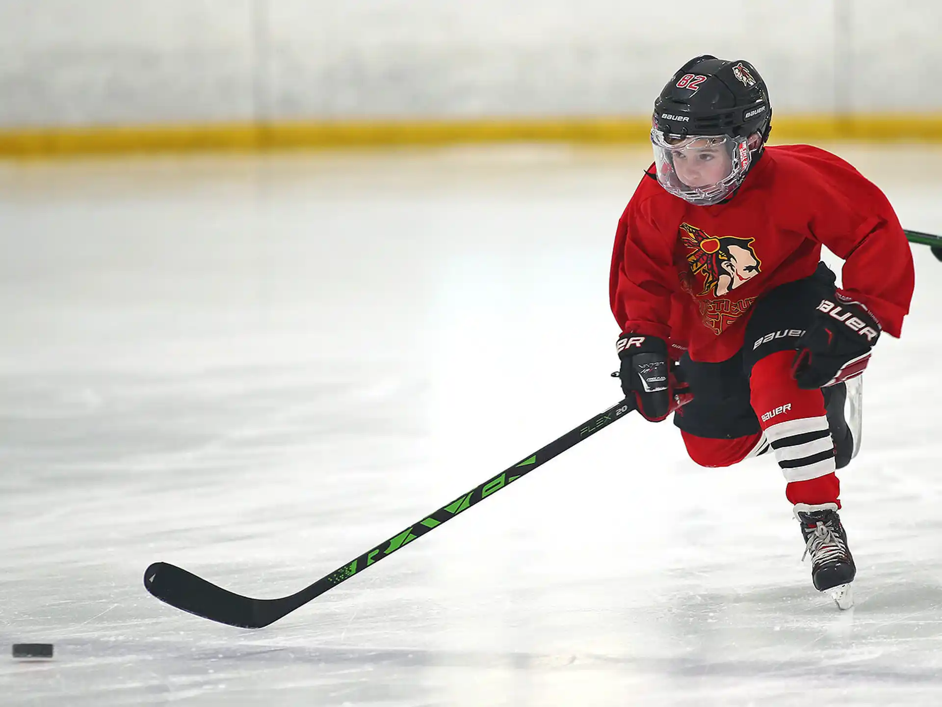 a man playing hockey