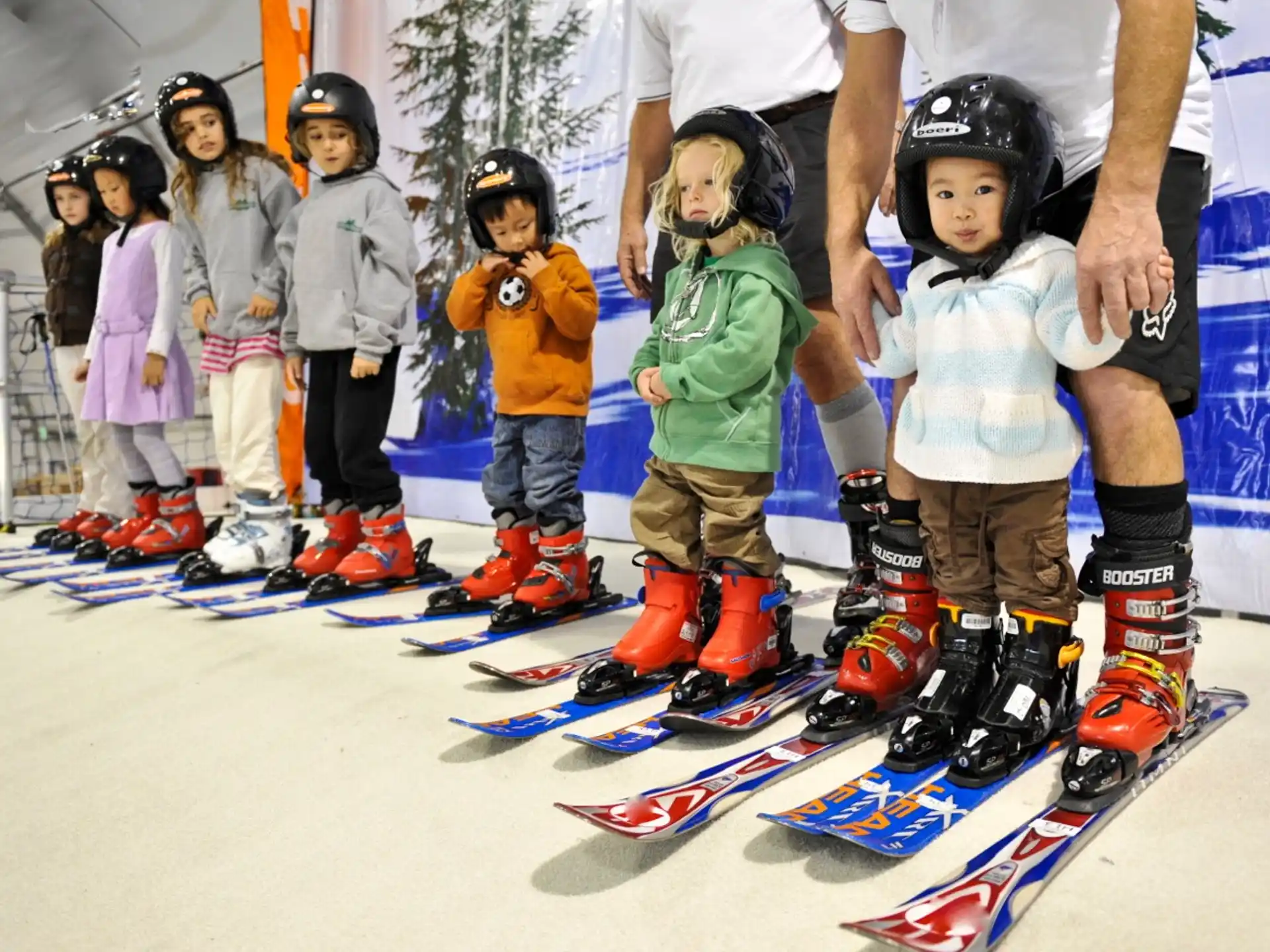 kids on skis in snow