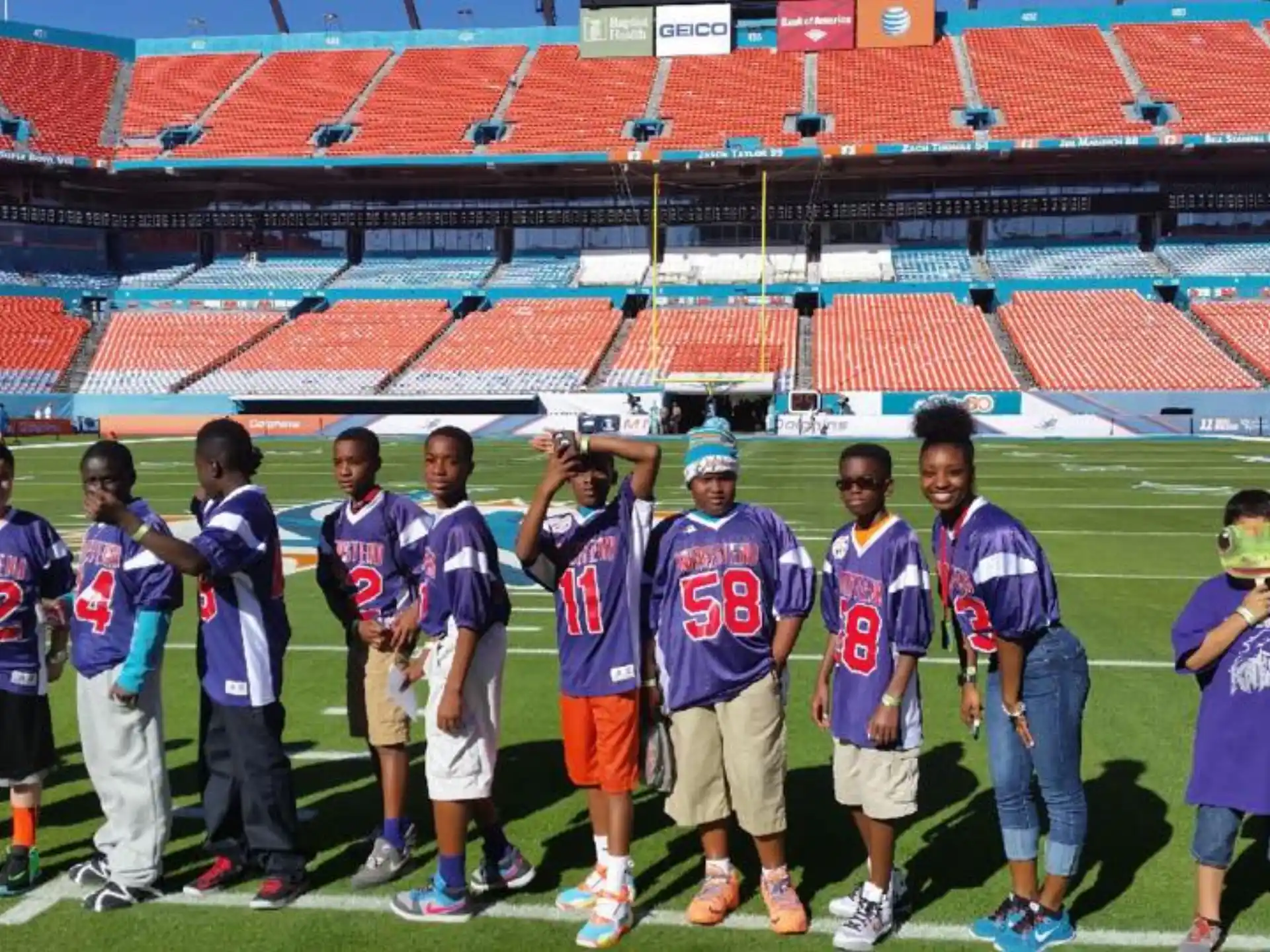 a group of people in sports uniforms