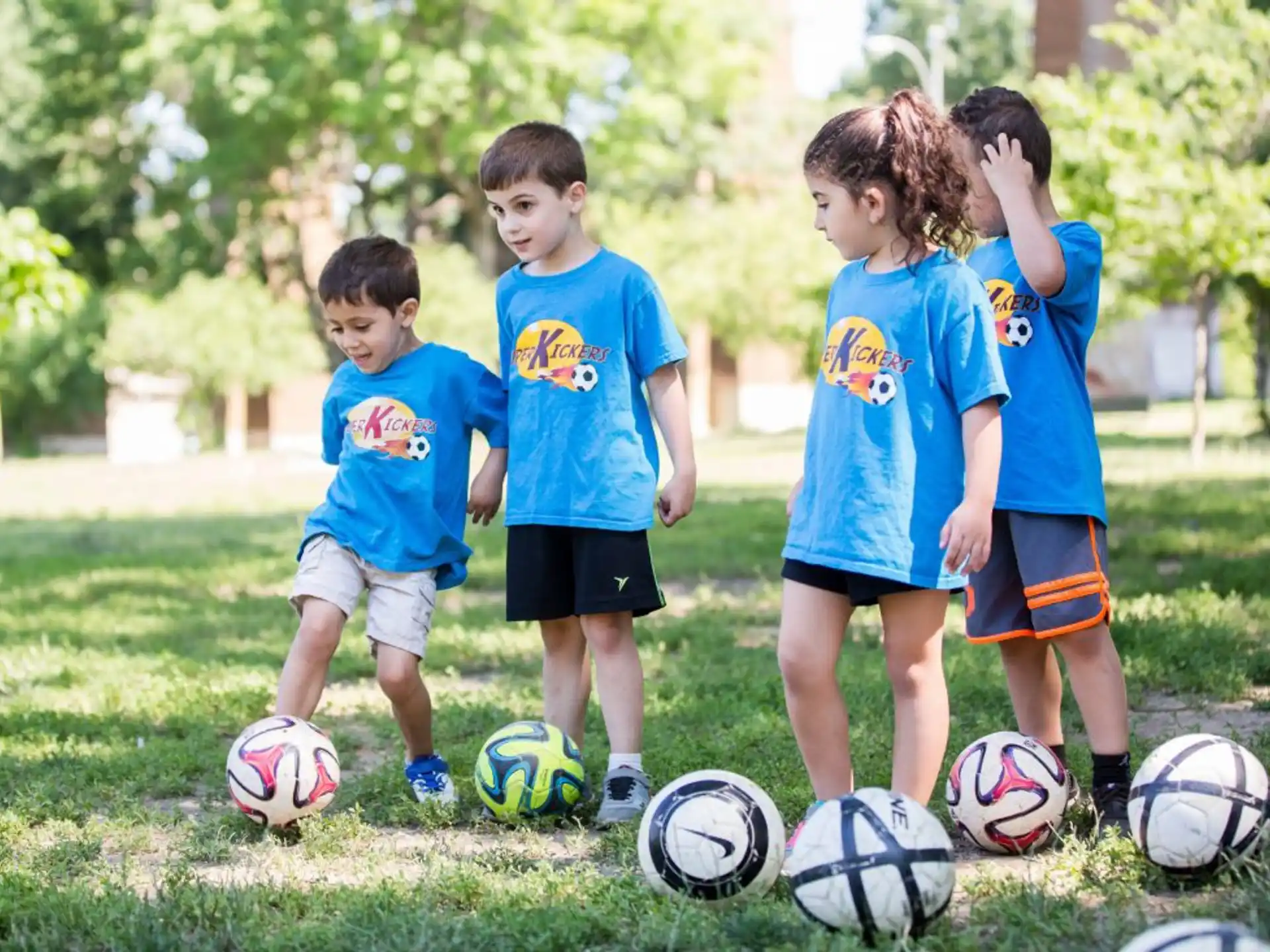 a group of kids playing football
