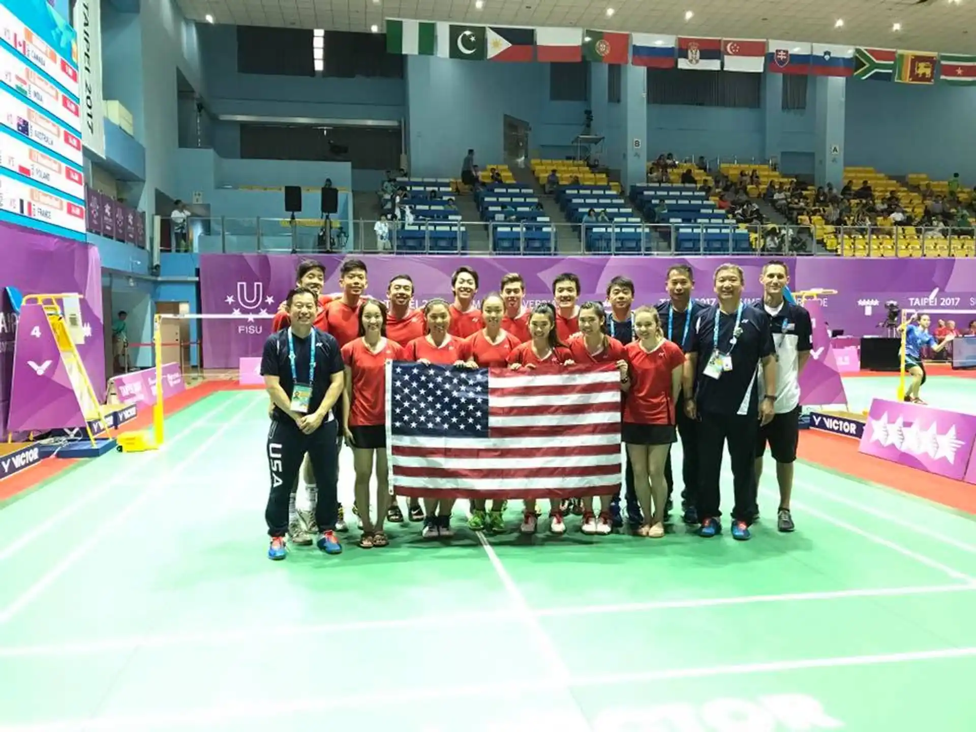 a group of people holding a flag