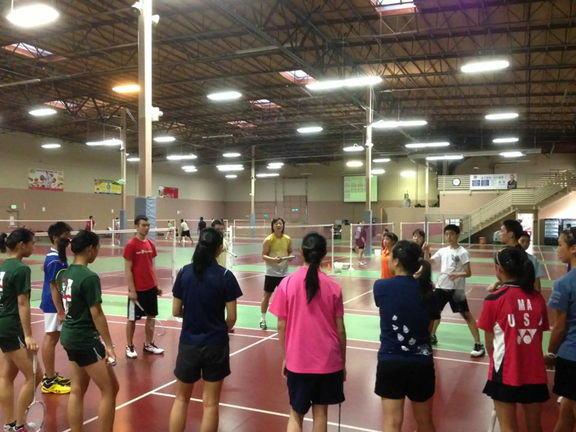 a group of people in a gym