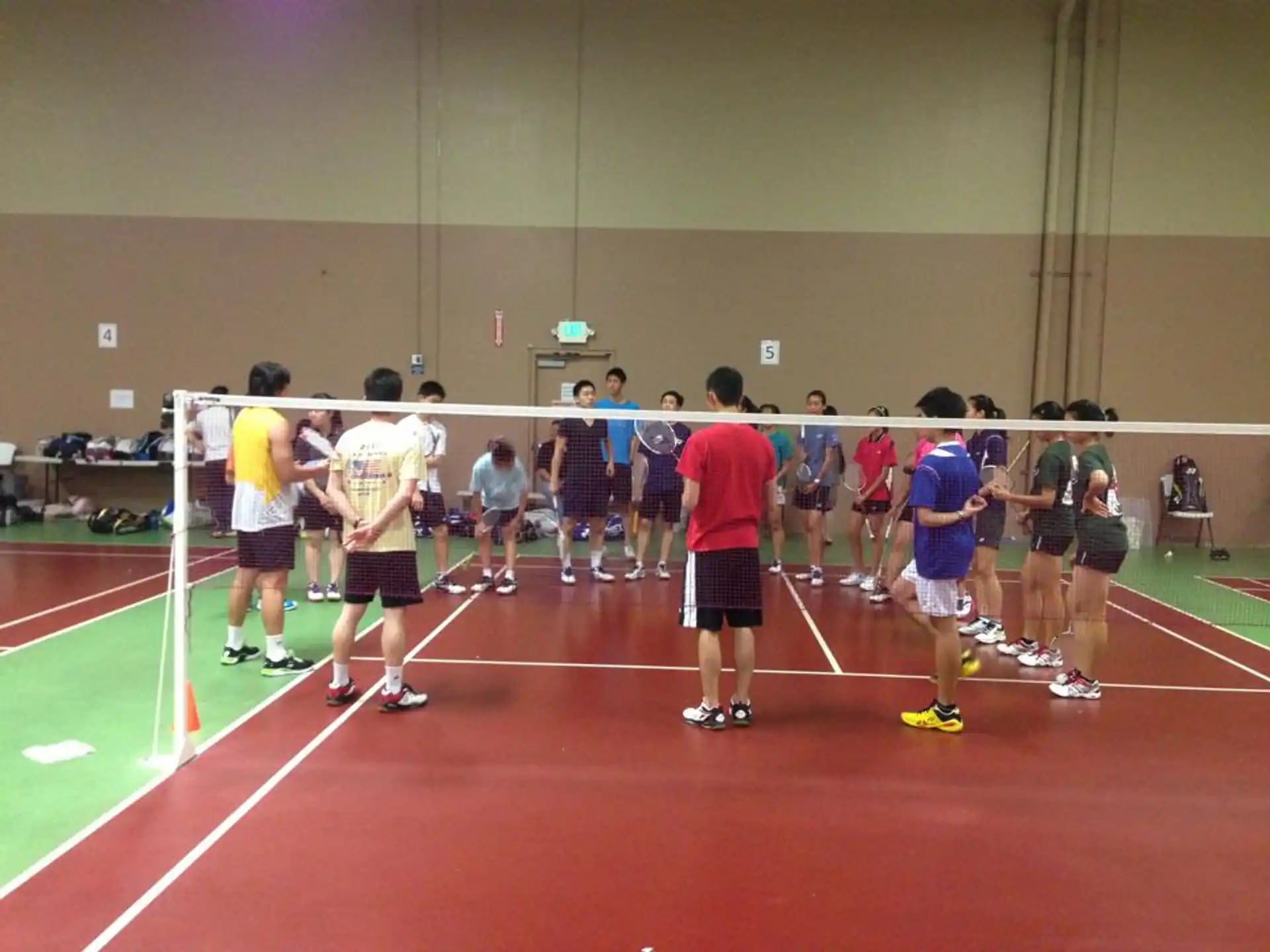 a group of people standing on a track