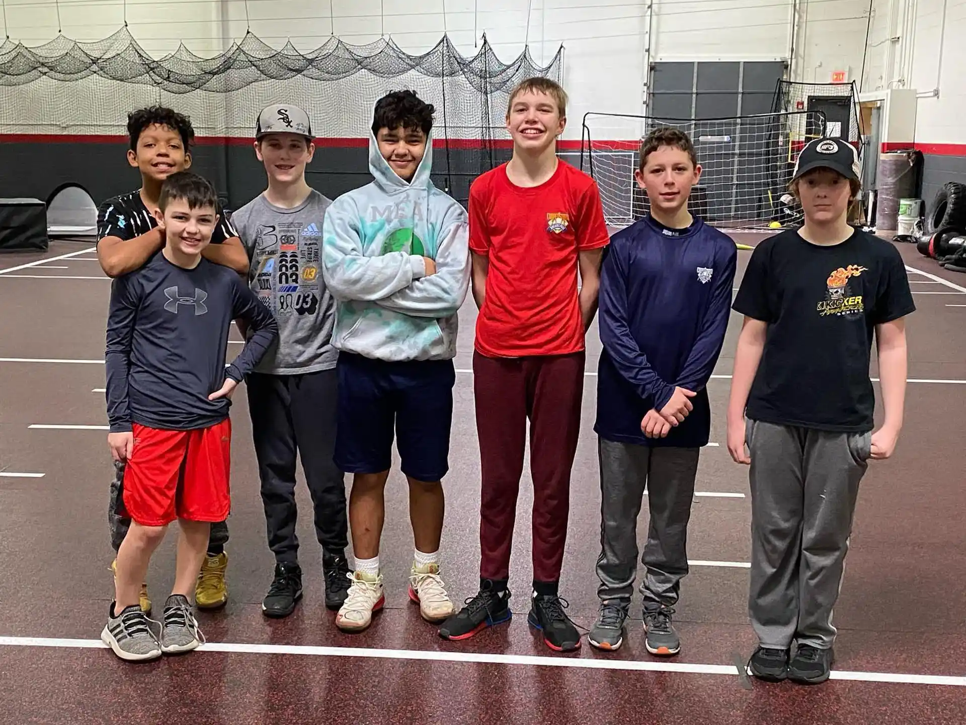 a group of boys posing for a photo