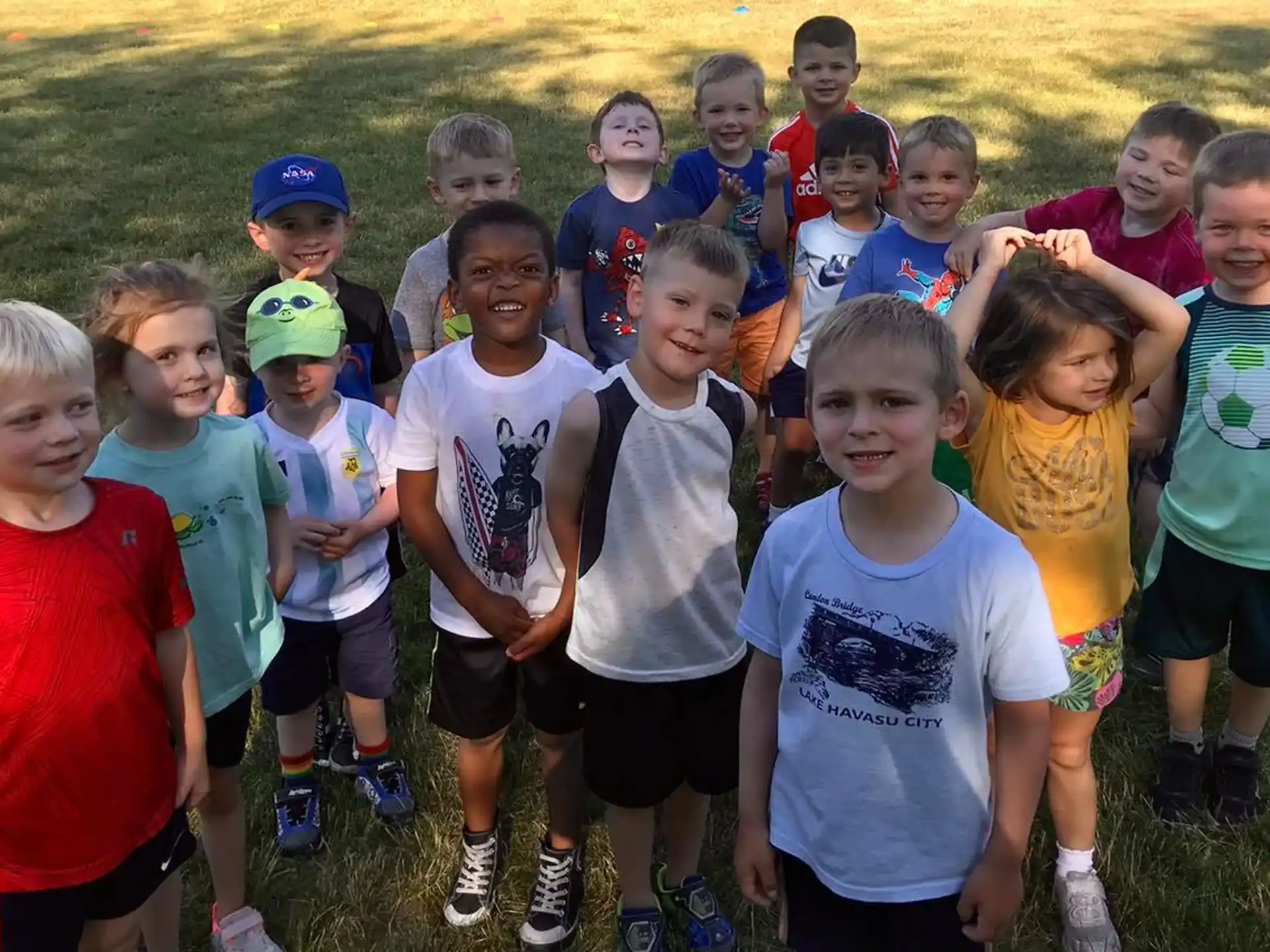 a group of children posing for a photo