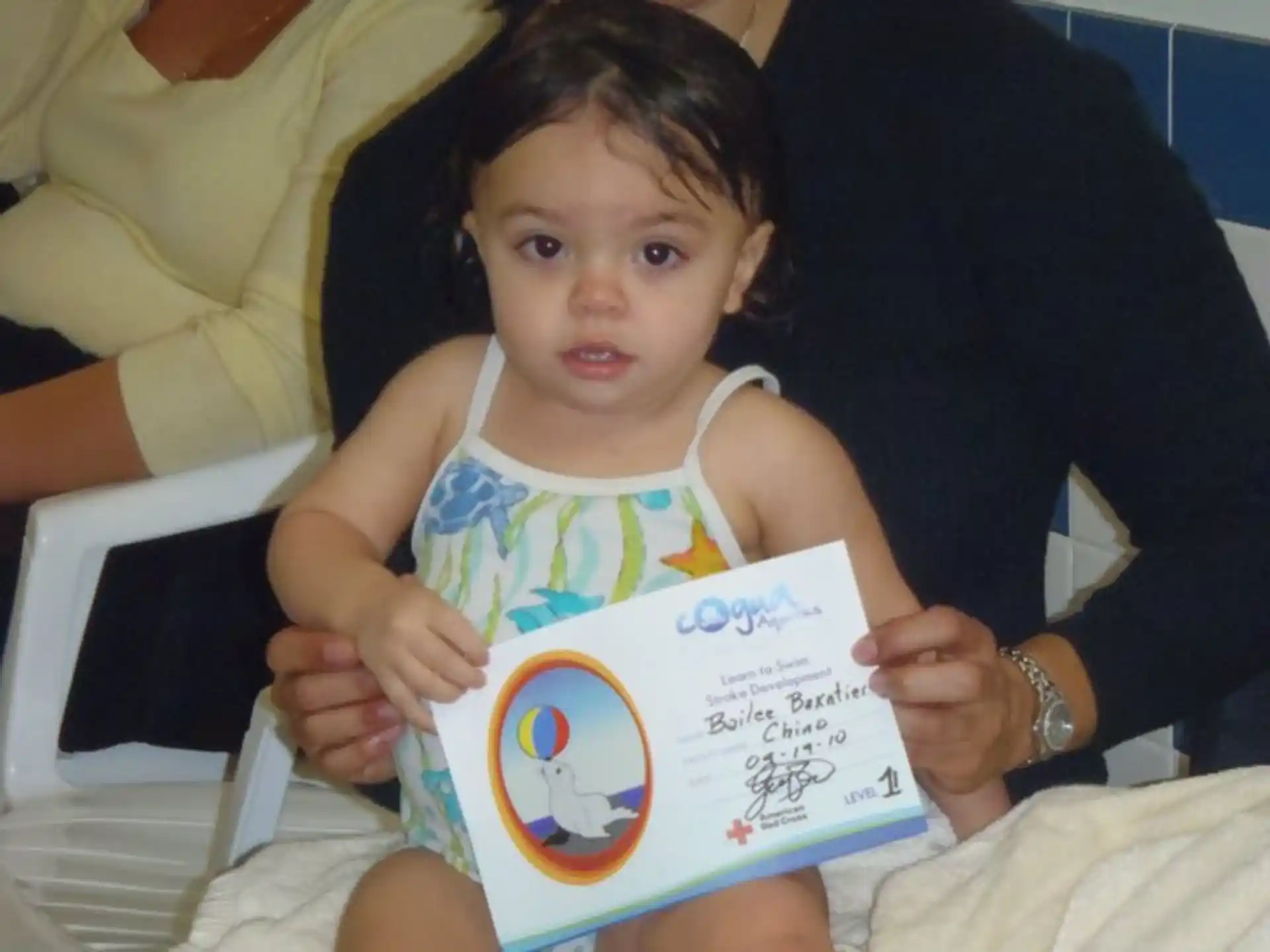 a child holding a book