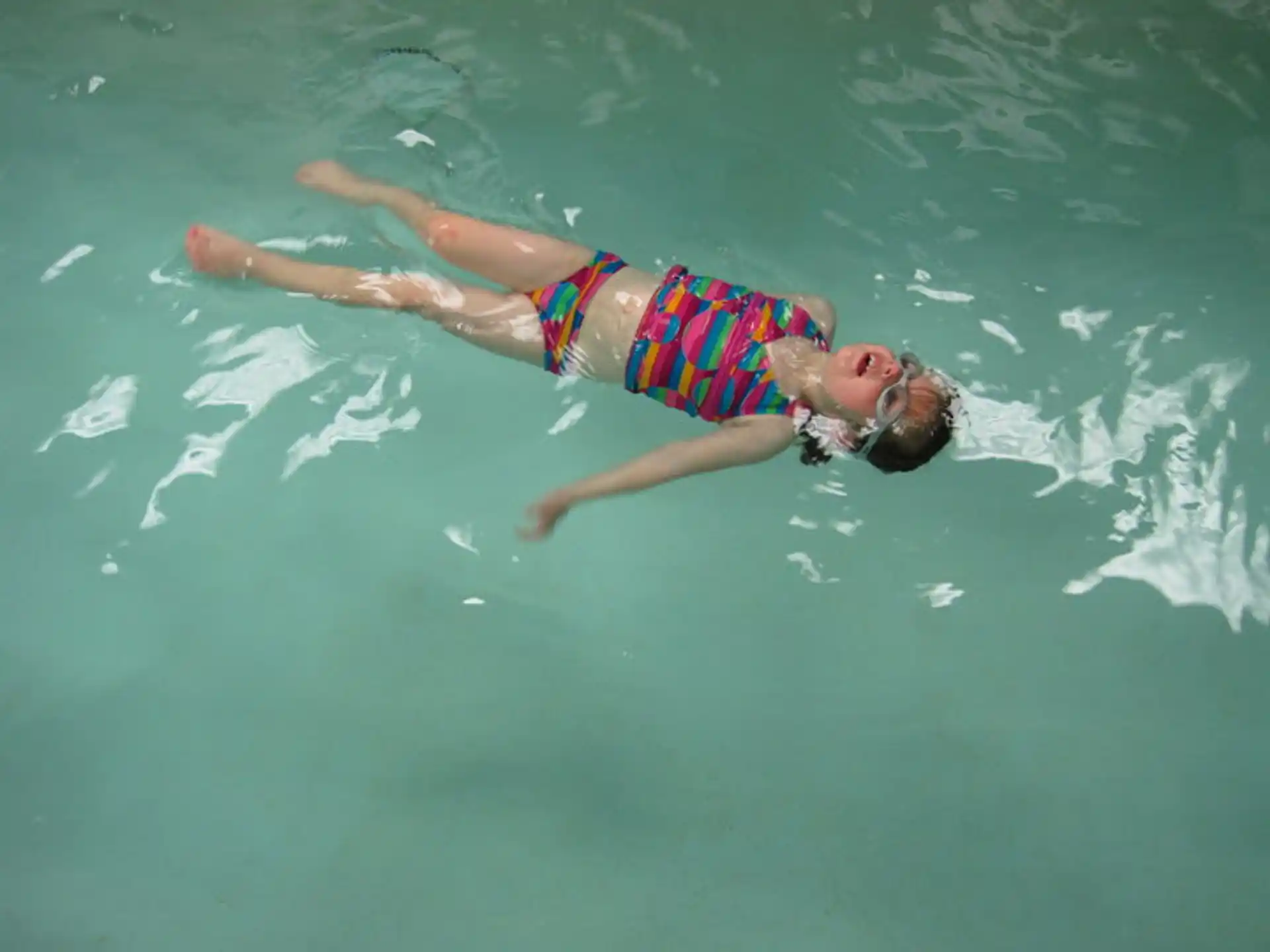 a person swimming in the water