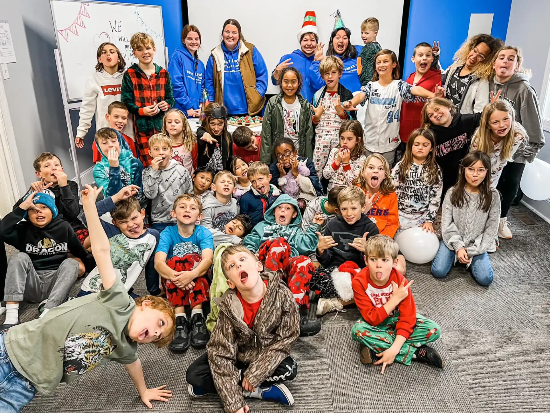 a group of people posing for a photo