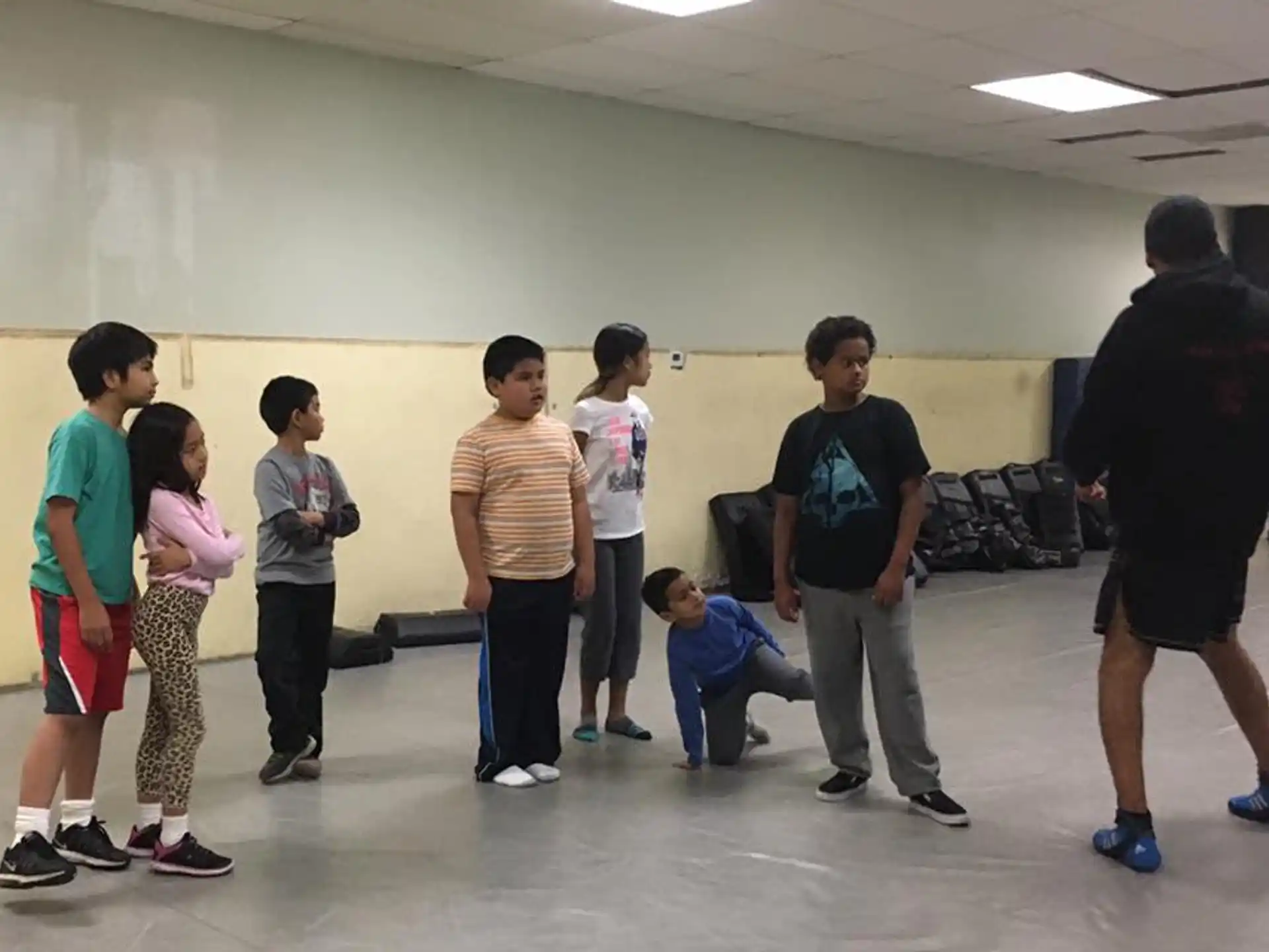 a group of people standing in a room
