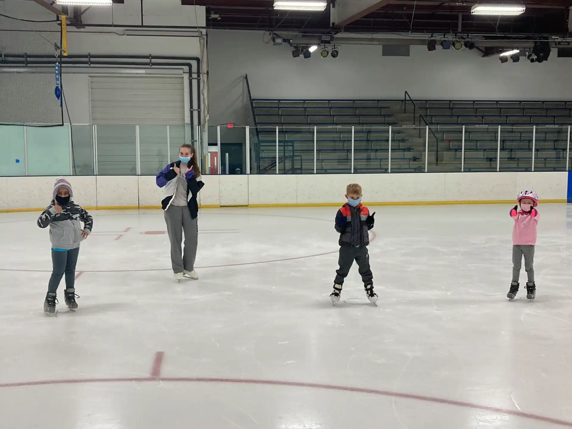 a group of people on an ice rink