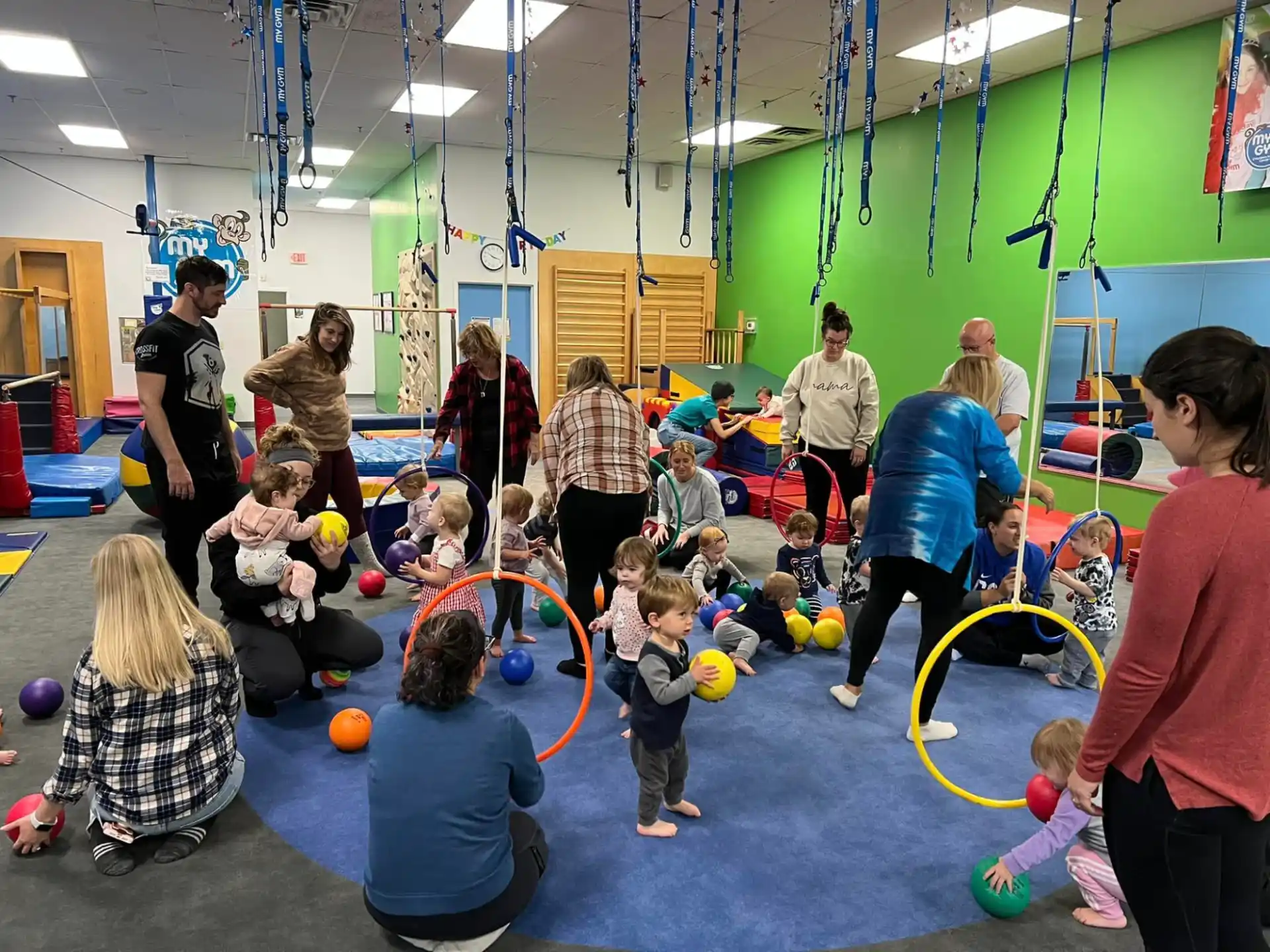 a group of people playing with balls