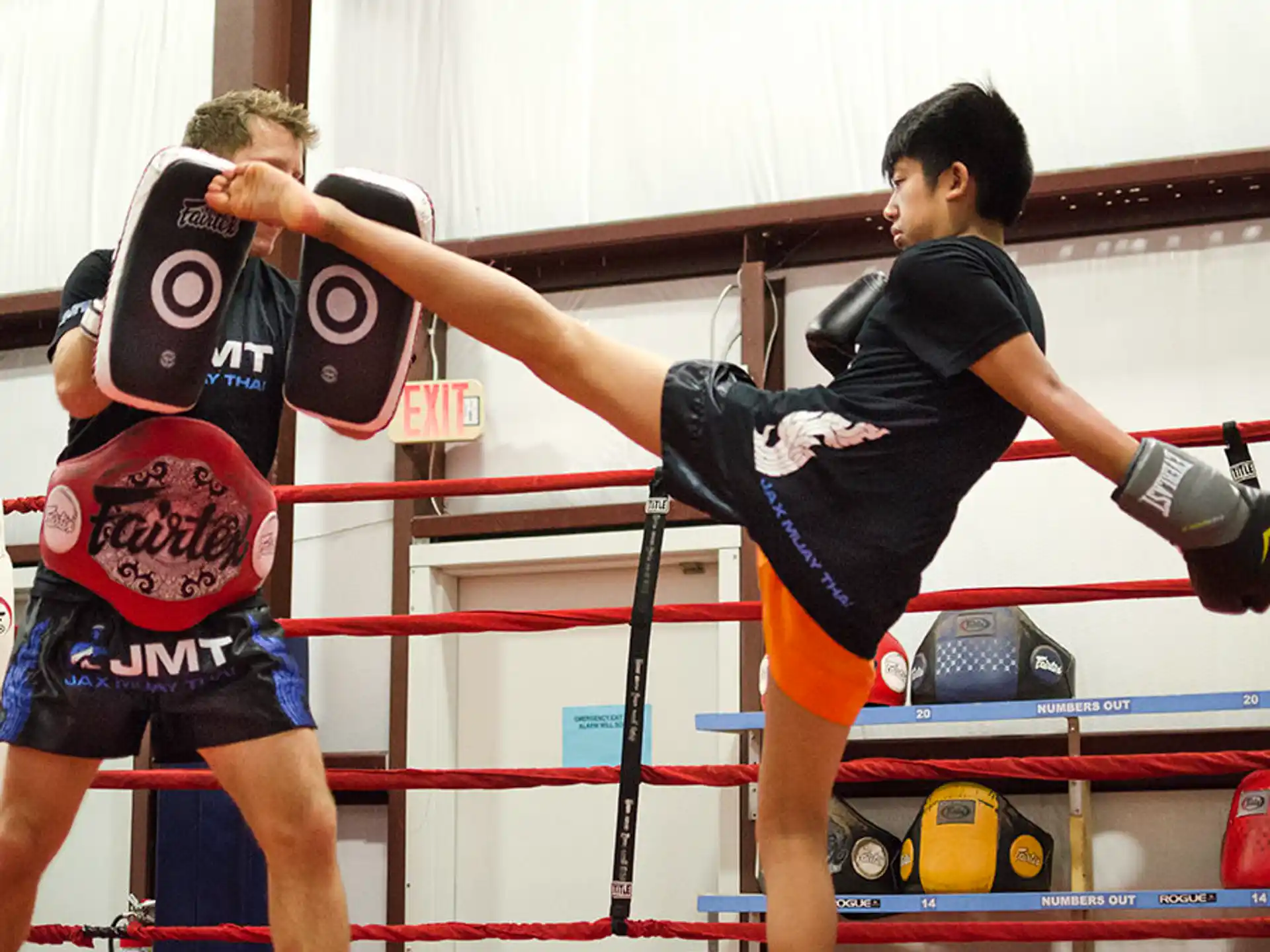 a couple of men in a boxing ring