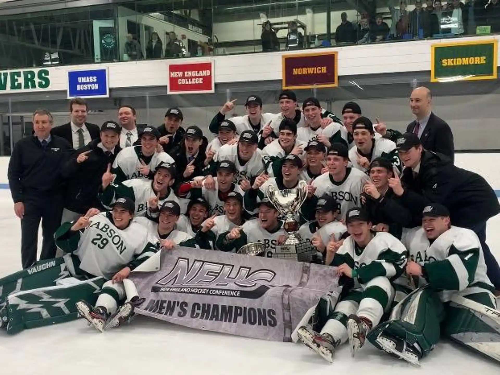 a group of hockey players posing for a photo