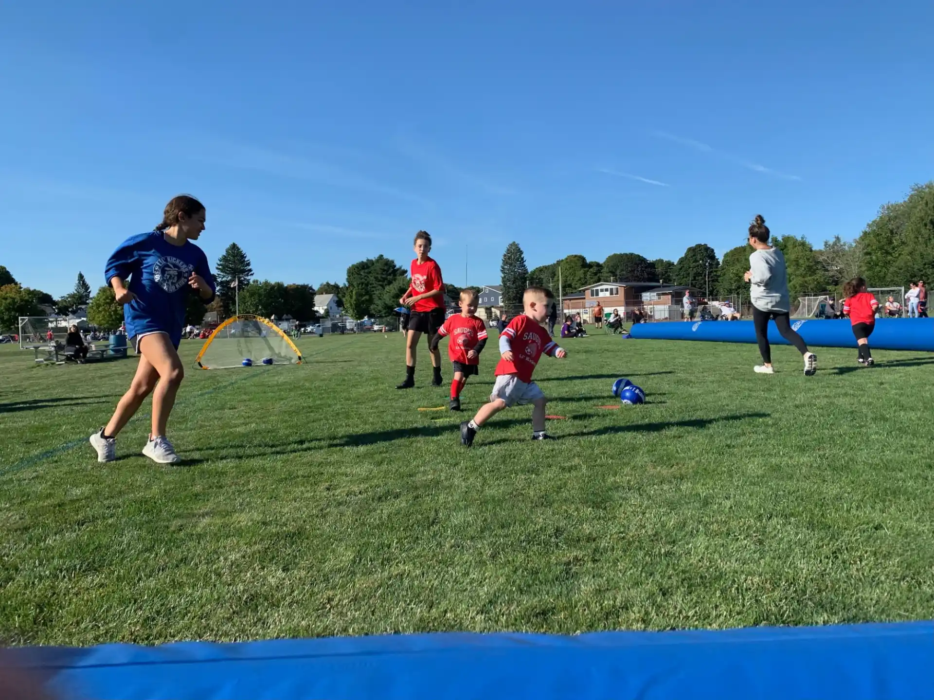 a group of people playing football