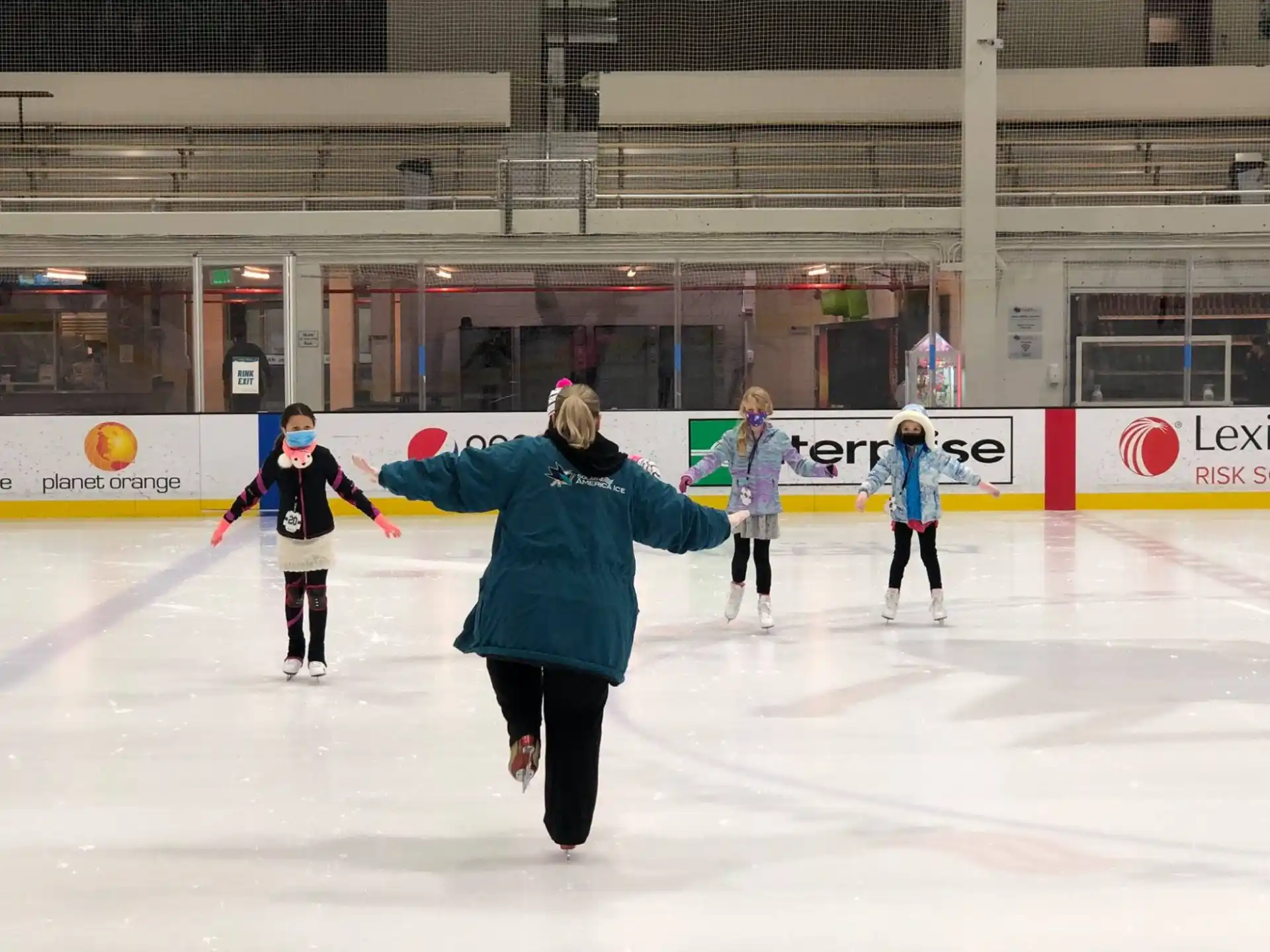 a group of people ice skating