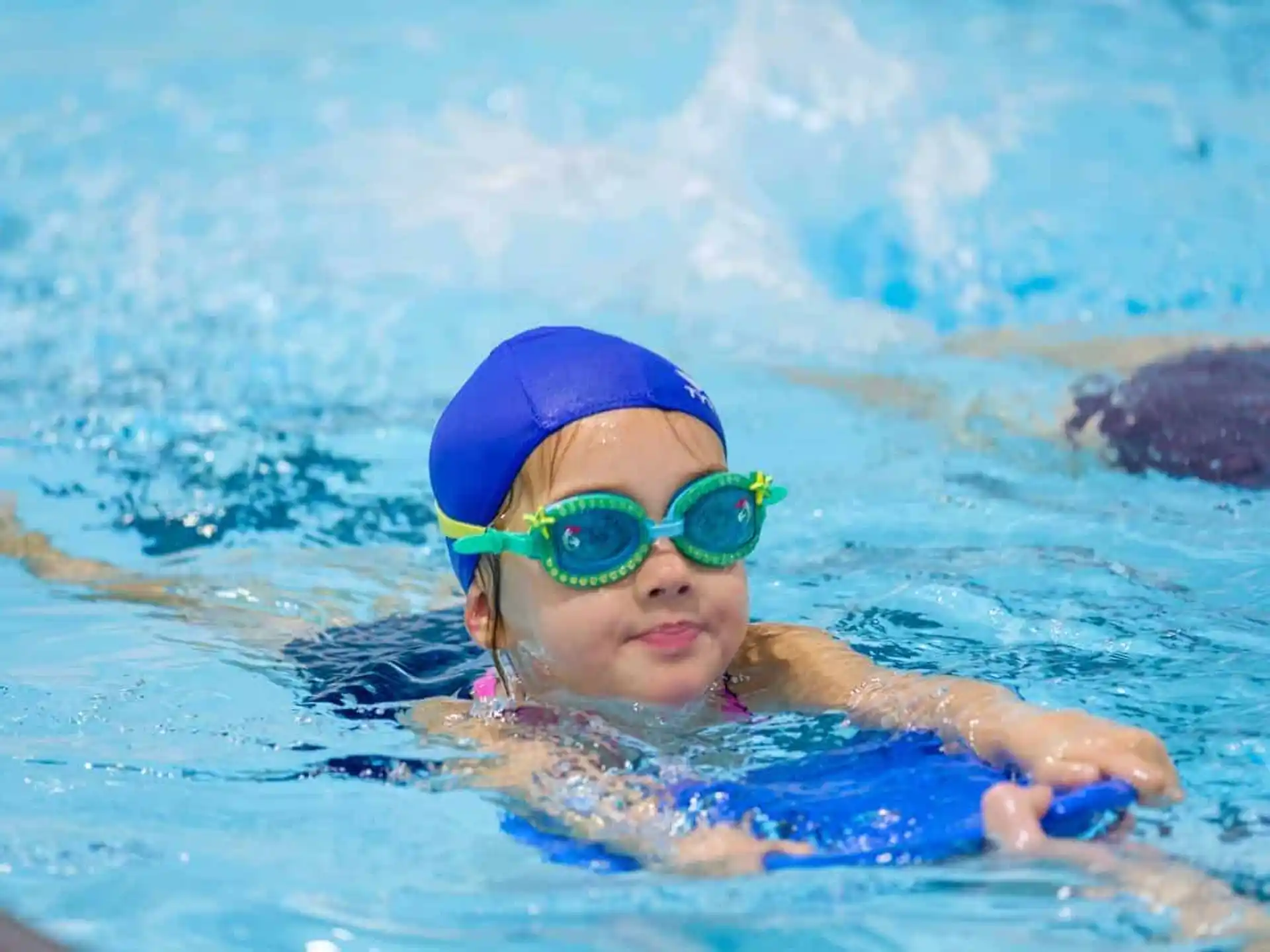 a child in a pool