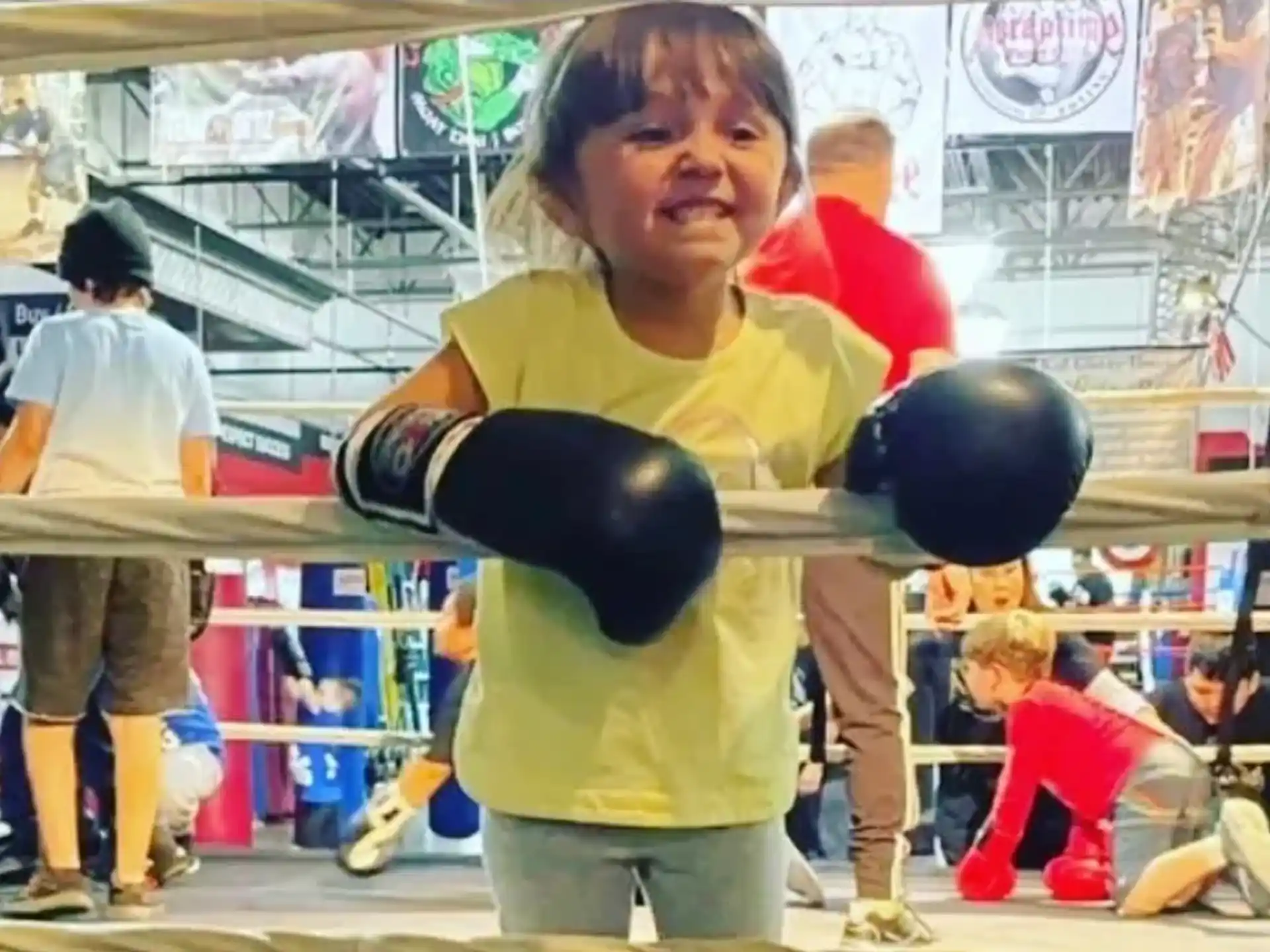 a young boy in a gym