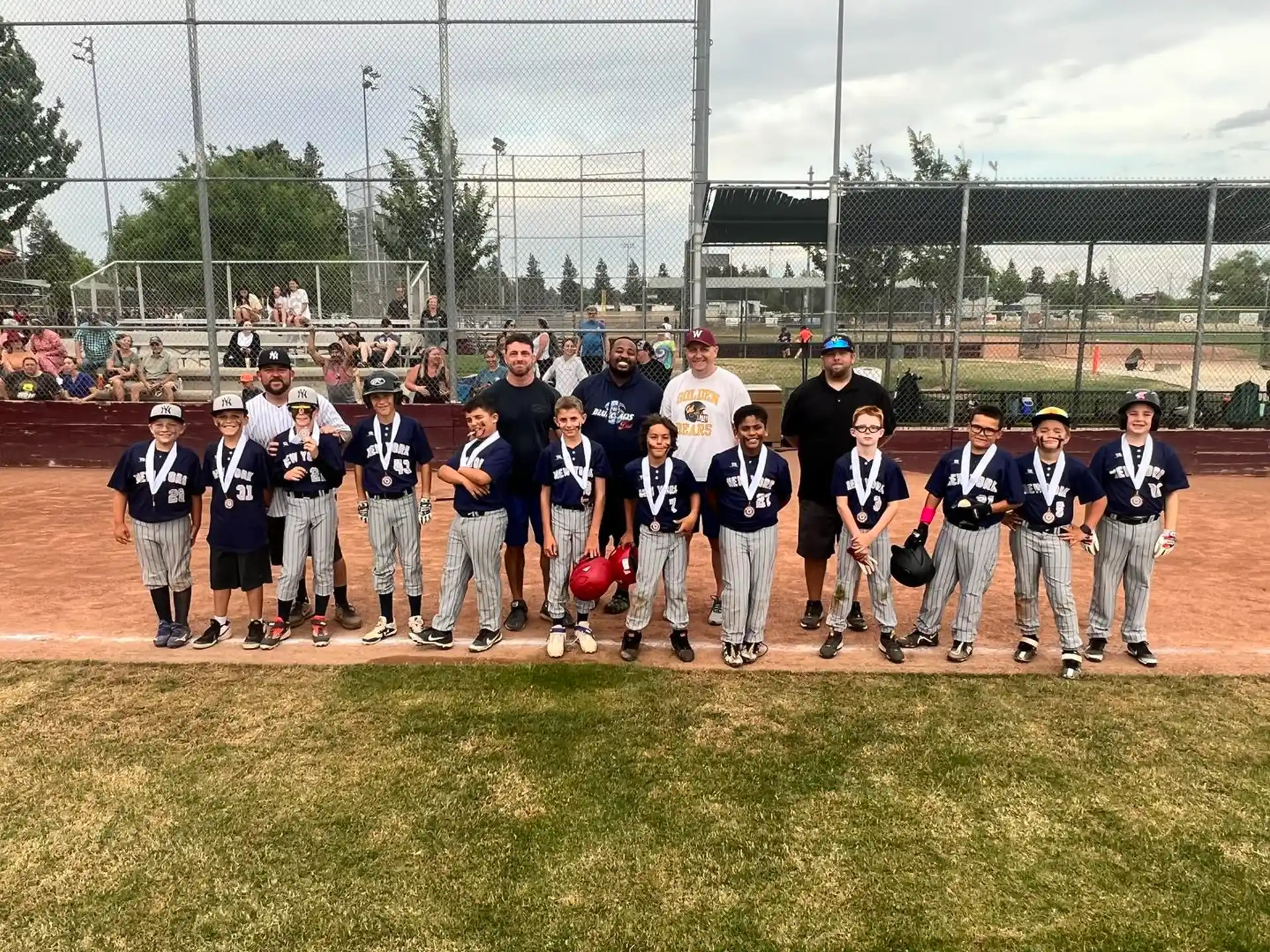 a group of baseball players posing for a photo