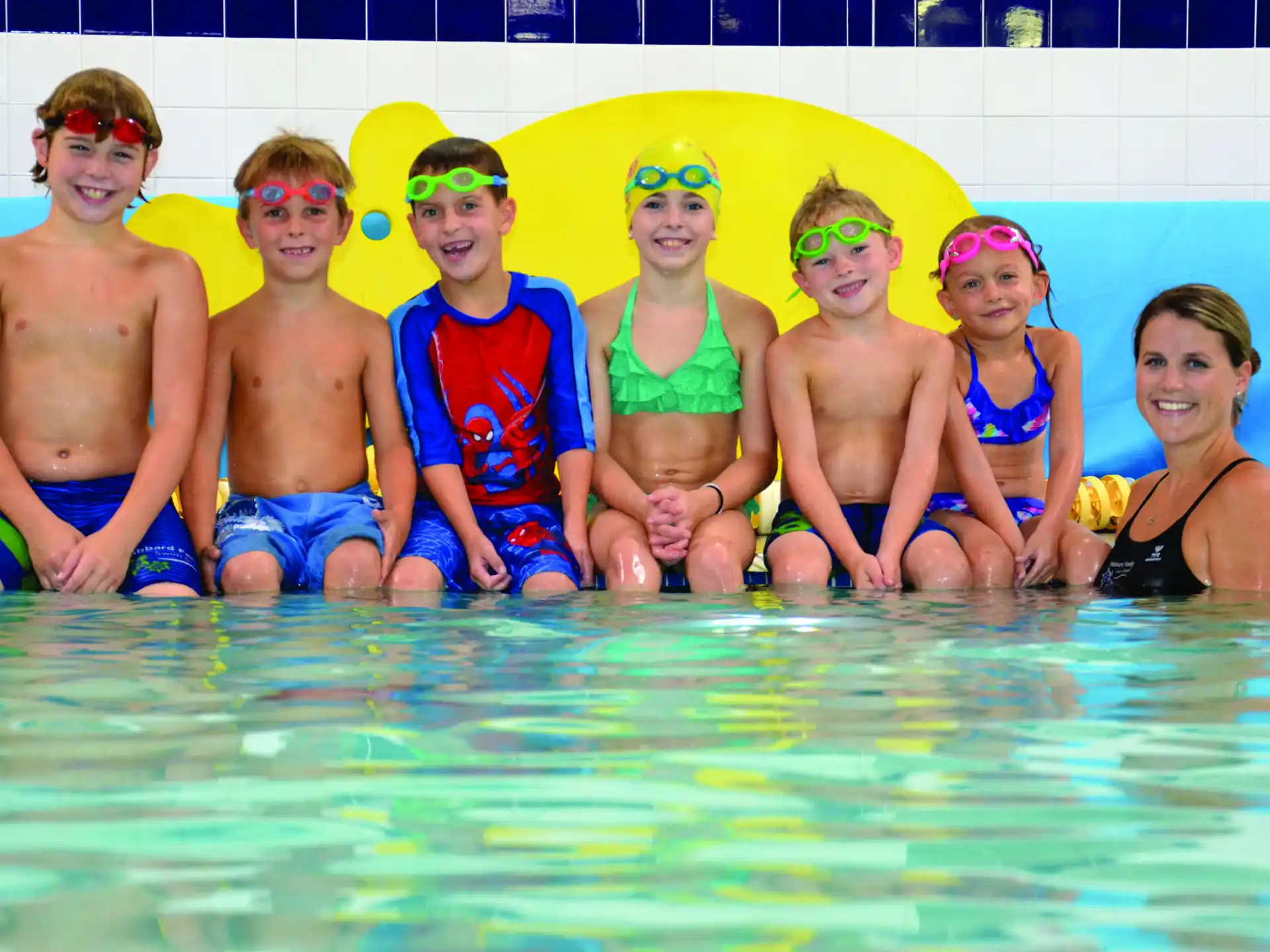 a group of people in a pool