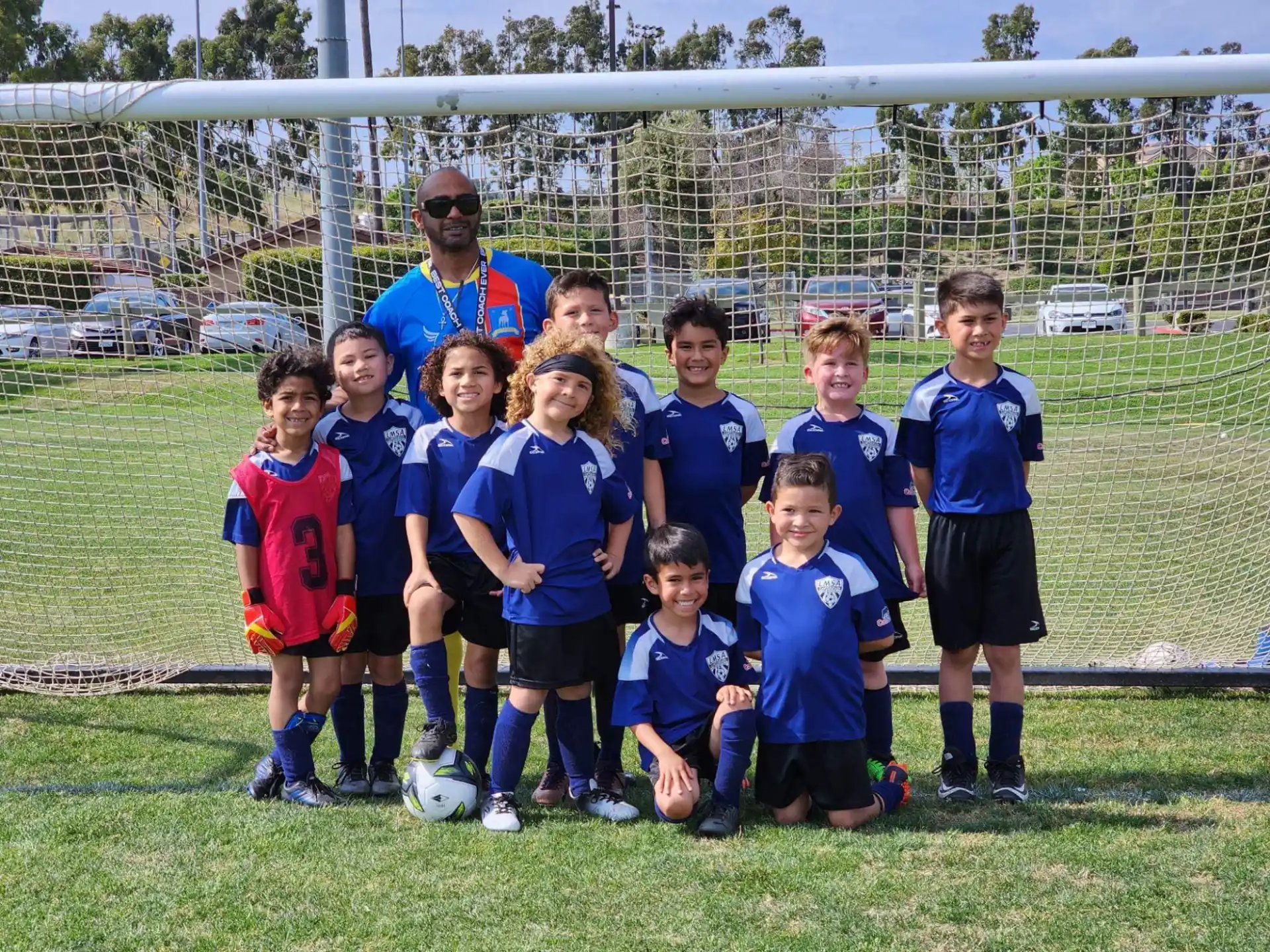 a group of kids posing for a picture