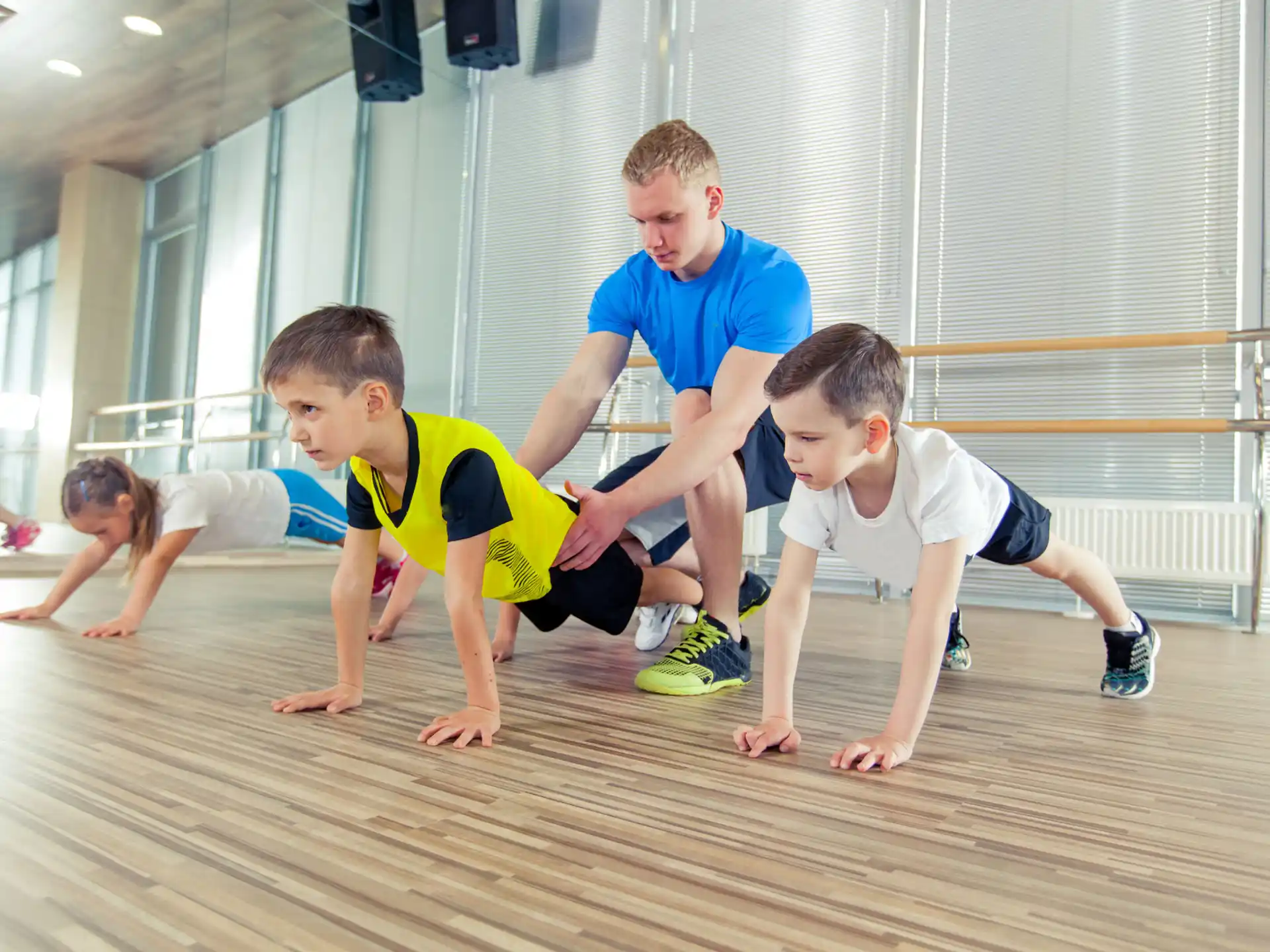 a group of kids playing on the floor