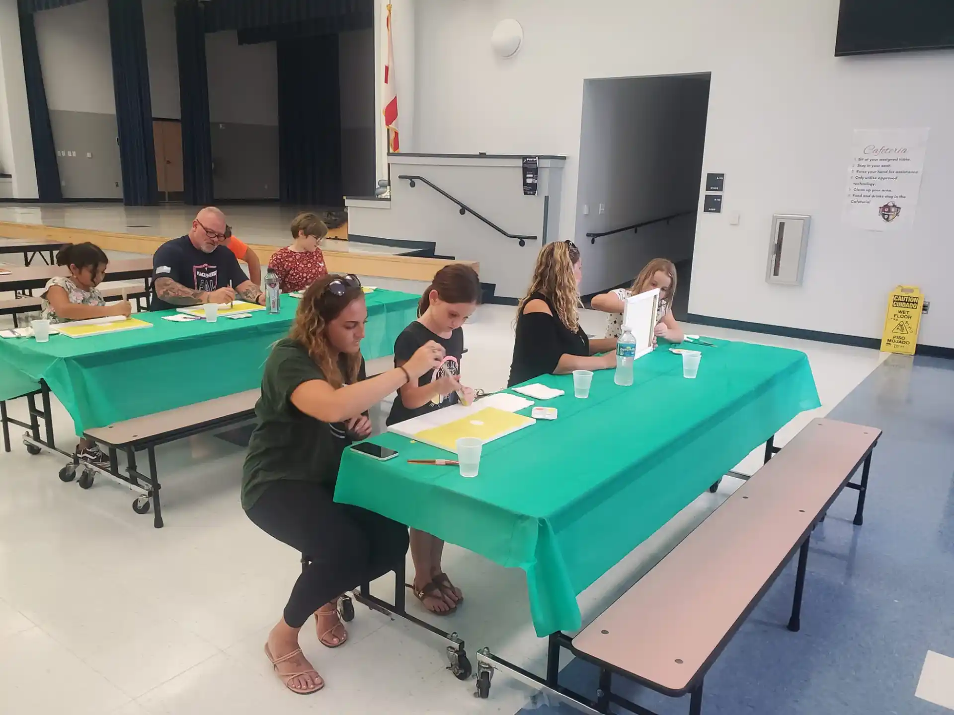 a group of people sitting at a table