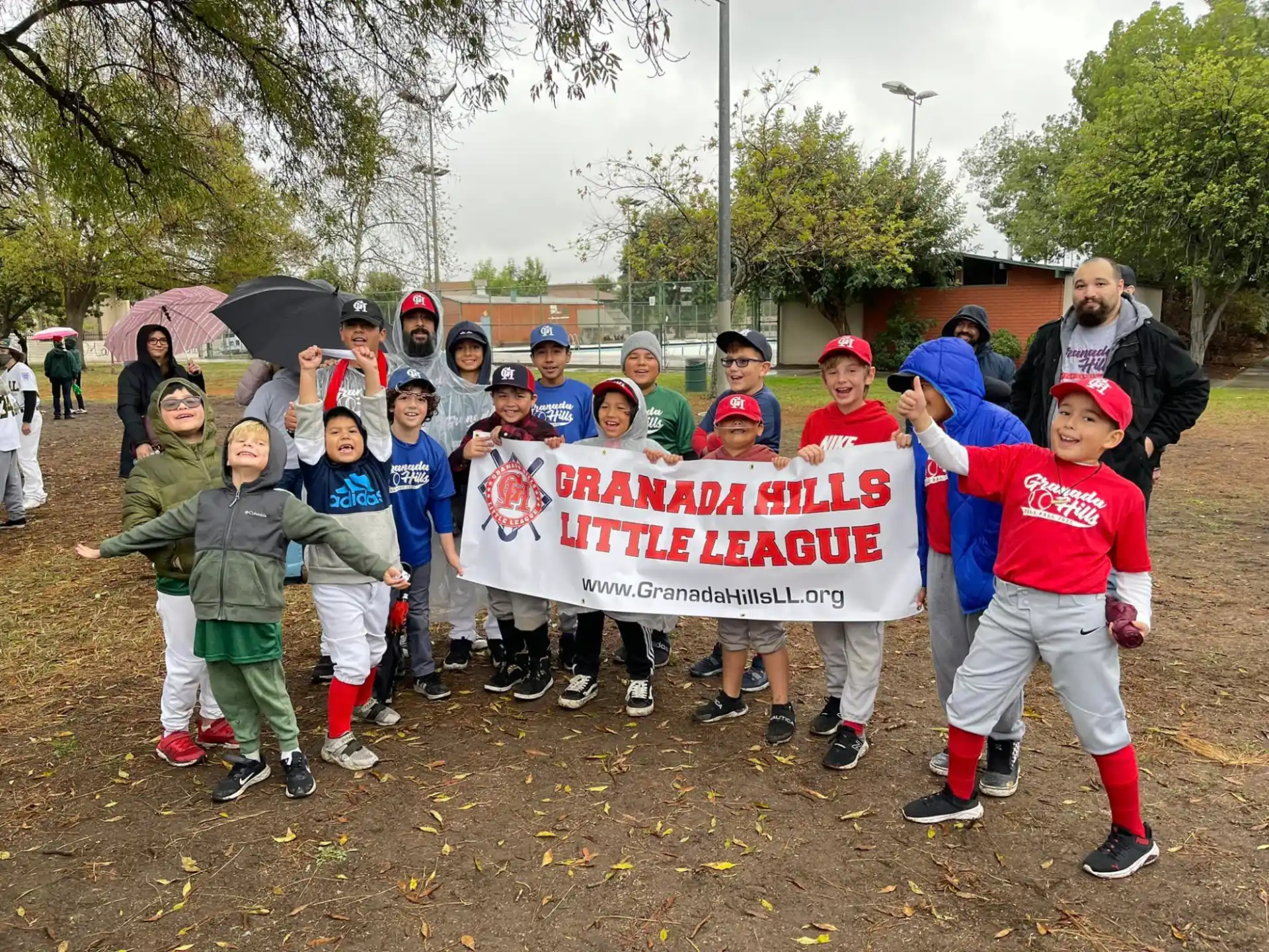 a group of people holding a sign