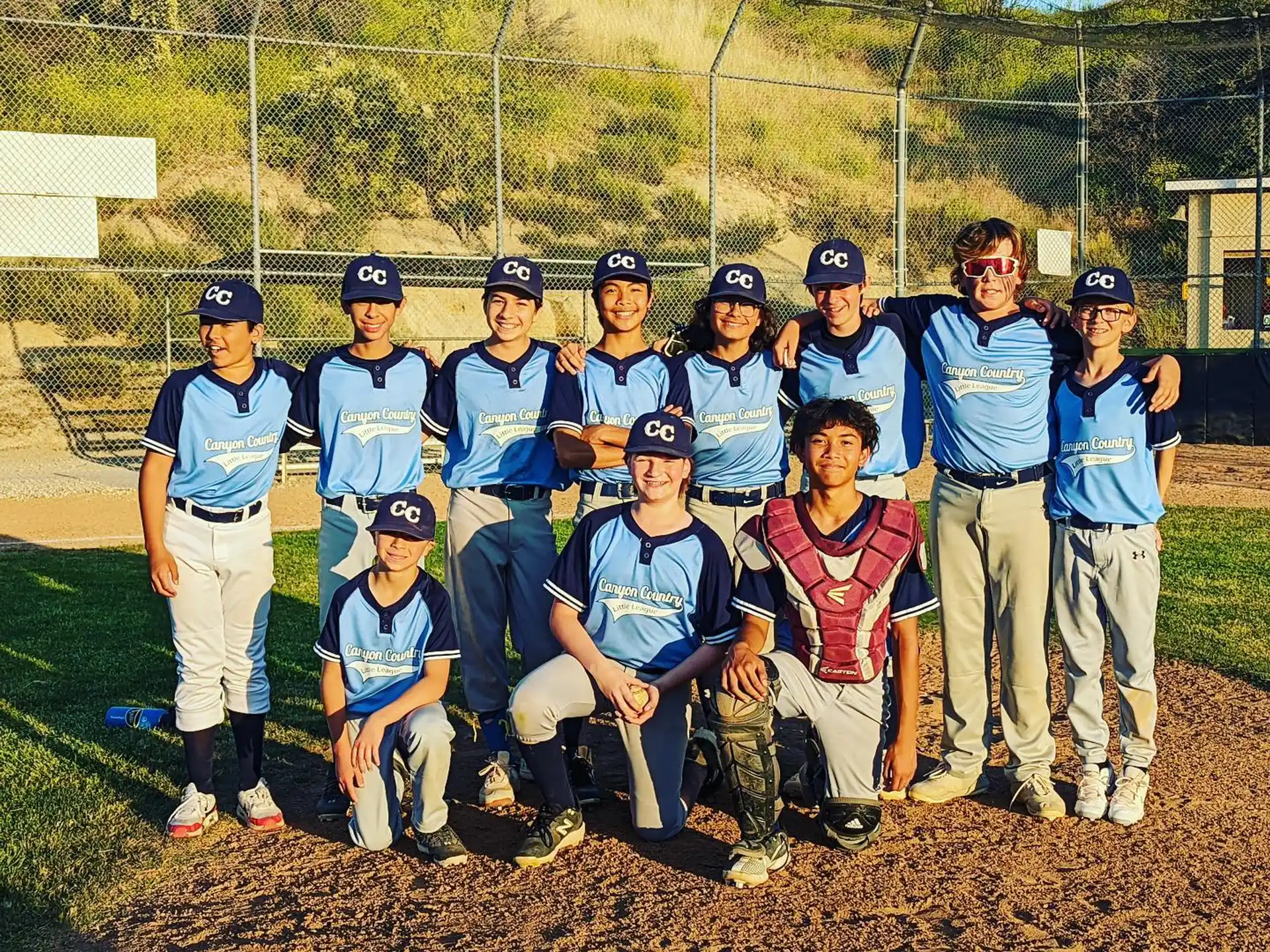 a group of baseball players posing for a photo