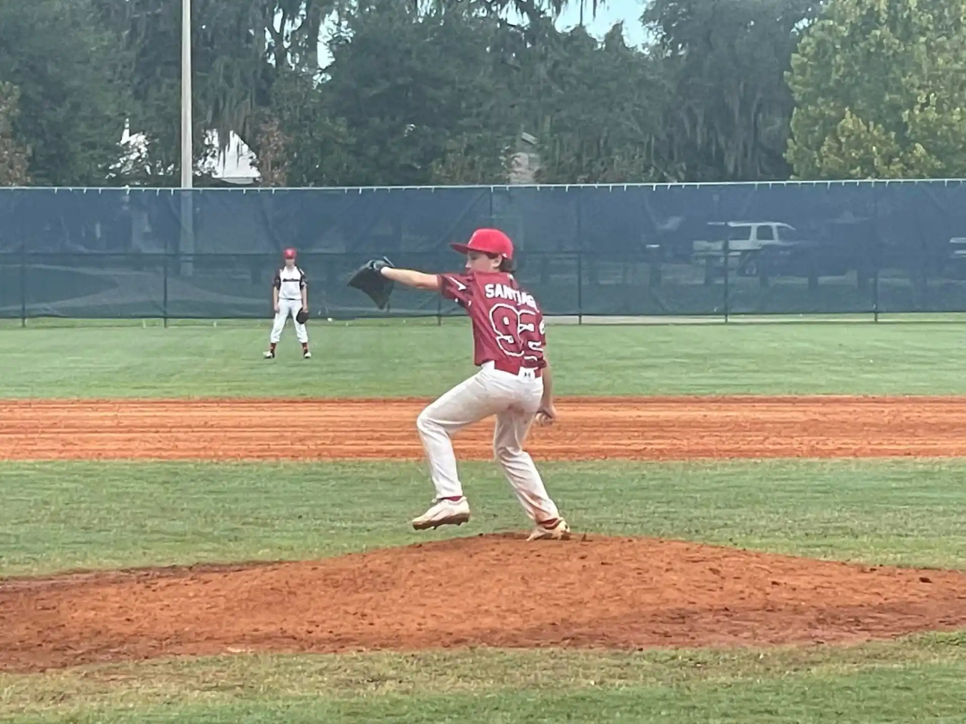 a baseball player throwing a ball