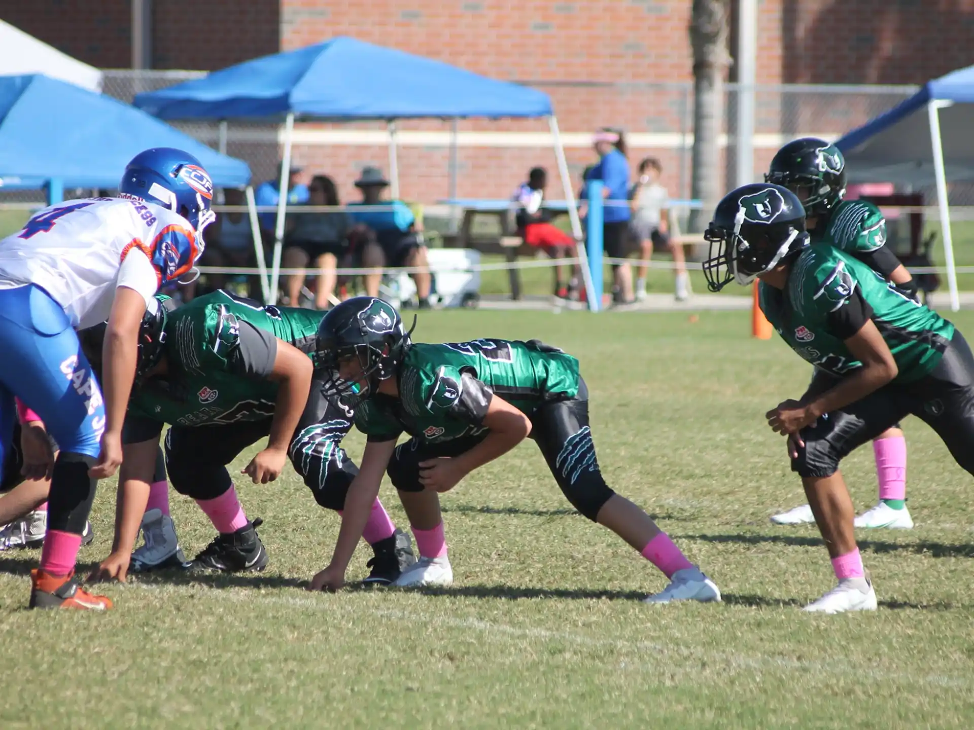 a group of people playing football