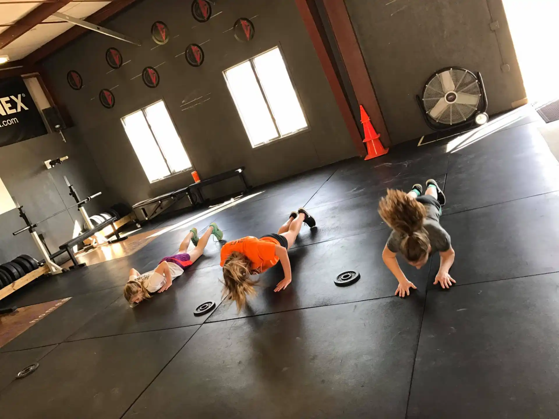 a group of women doing yoga