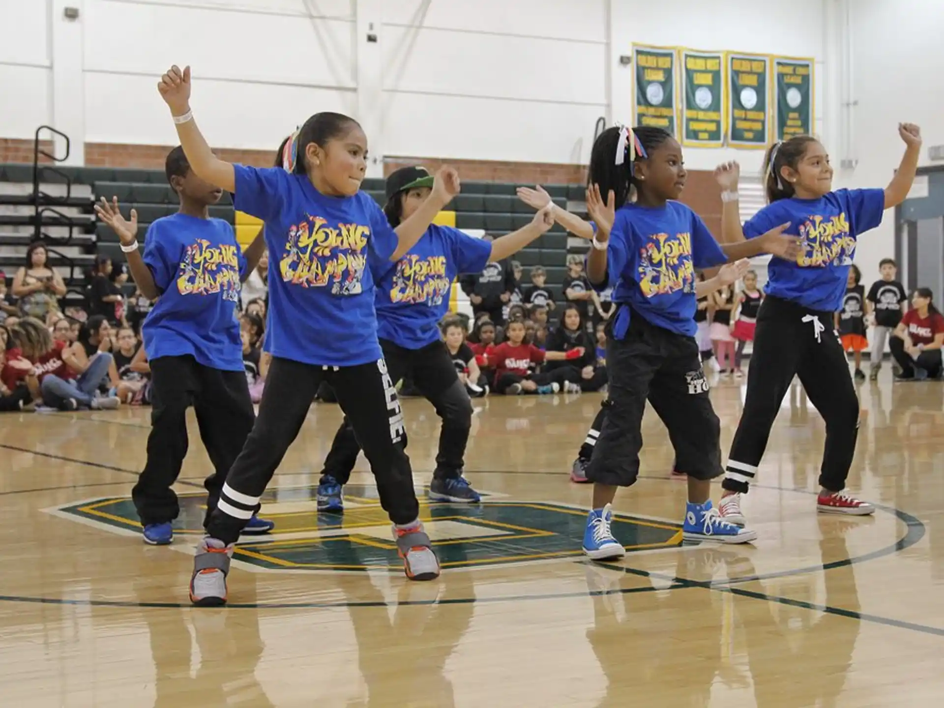 a group of girls in a gym