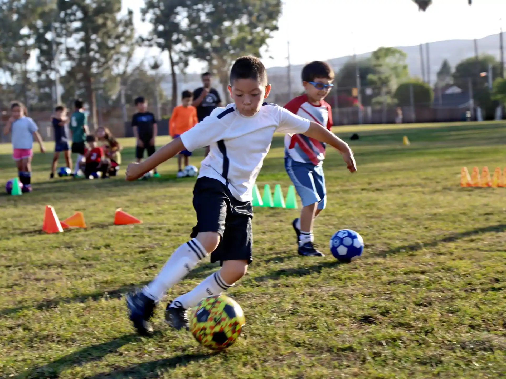 kids playing football on a field
