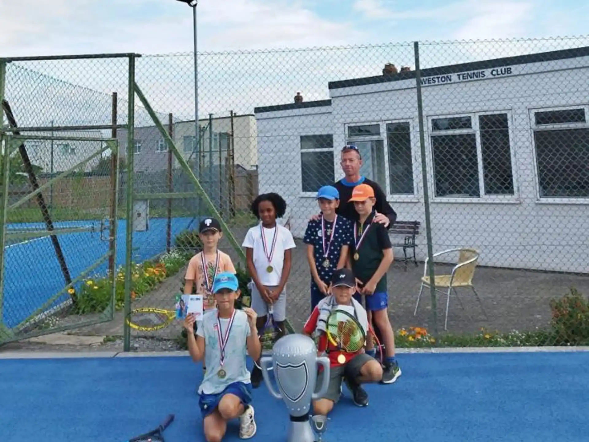 a group of people posing for a photo