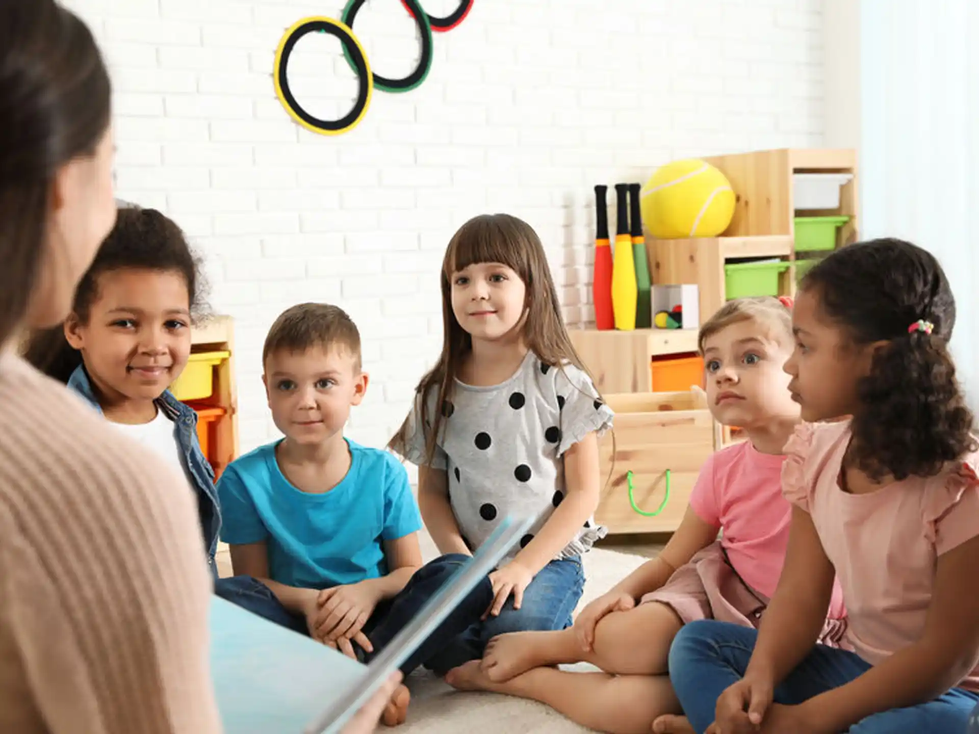 a group of children sitting on a couch