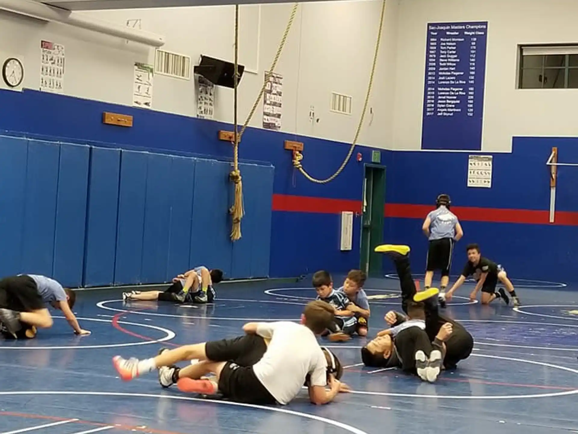 a group of people in a gym