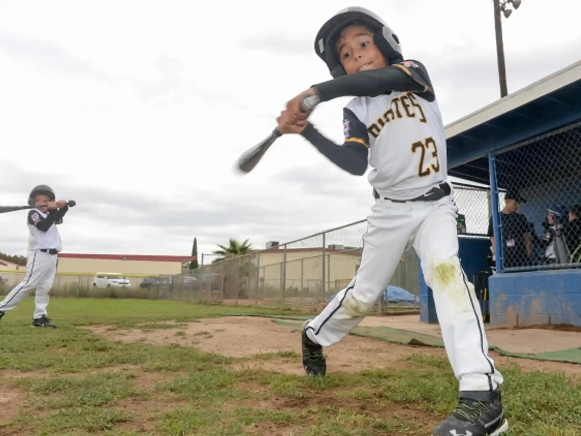 a baseball player swinging a bat