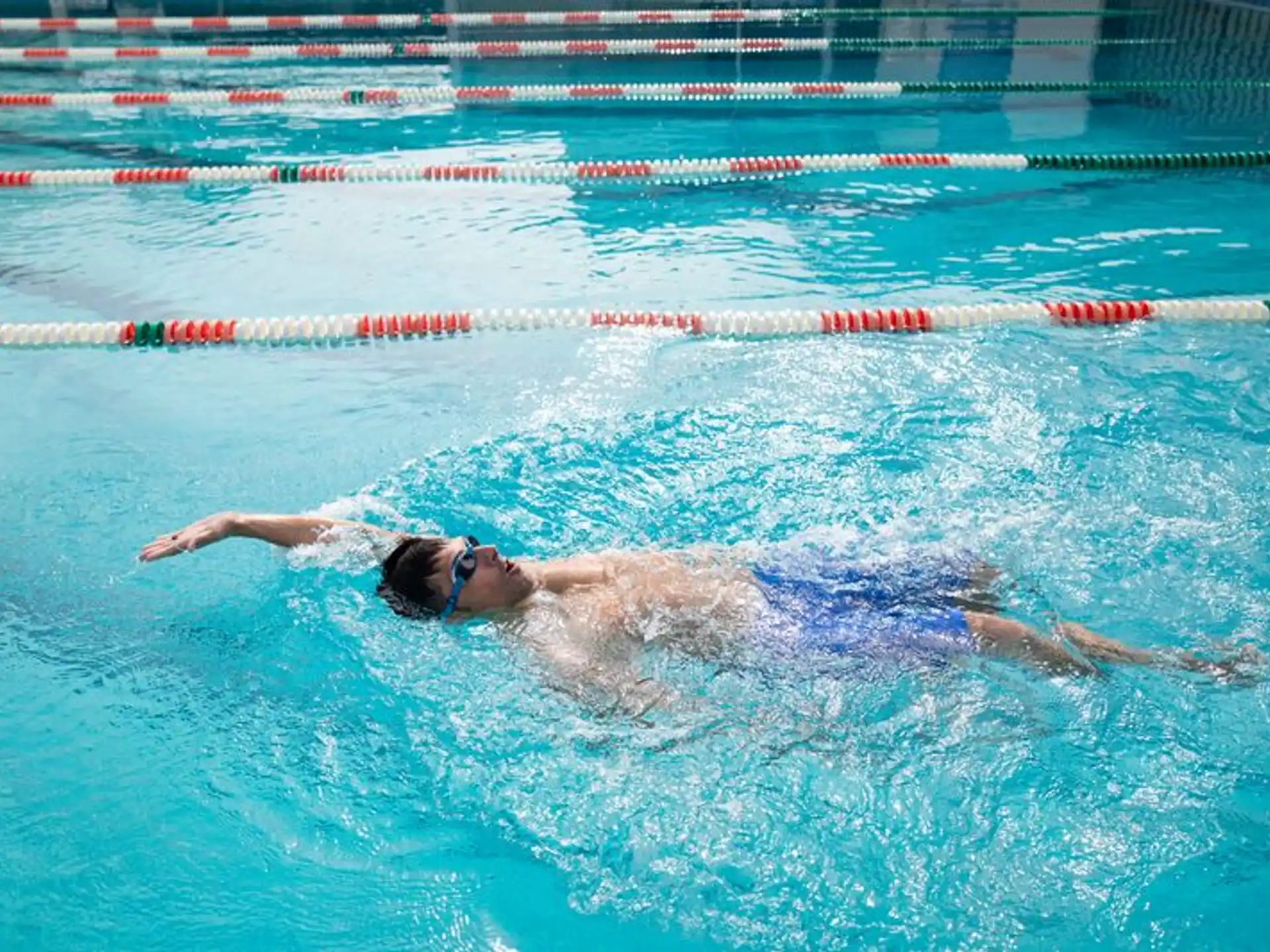 a person swimming in a pool