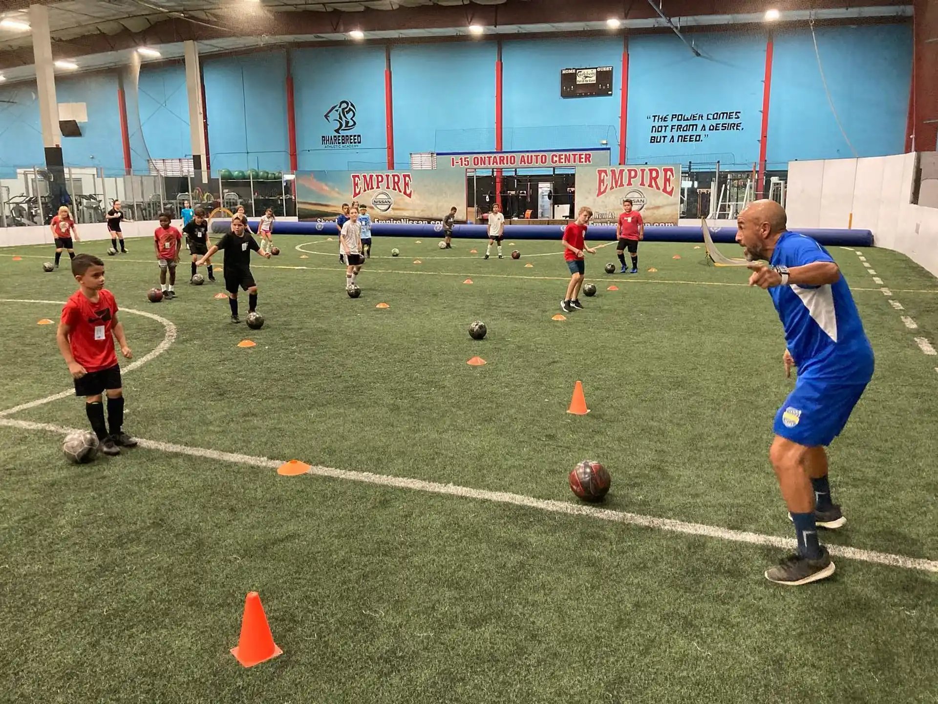 a group of kids playing football