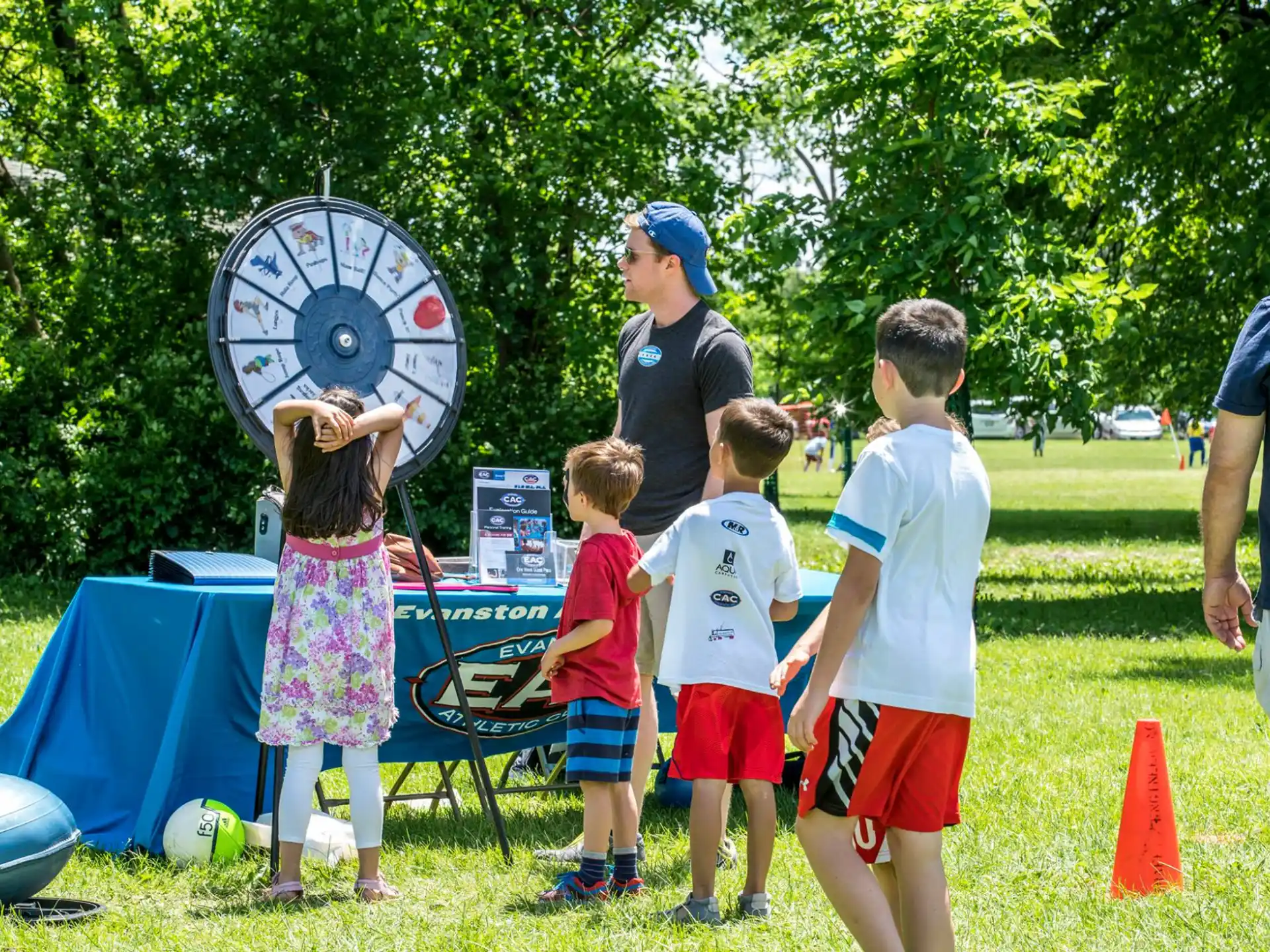 a group of people standing around a large target