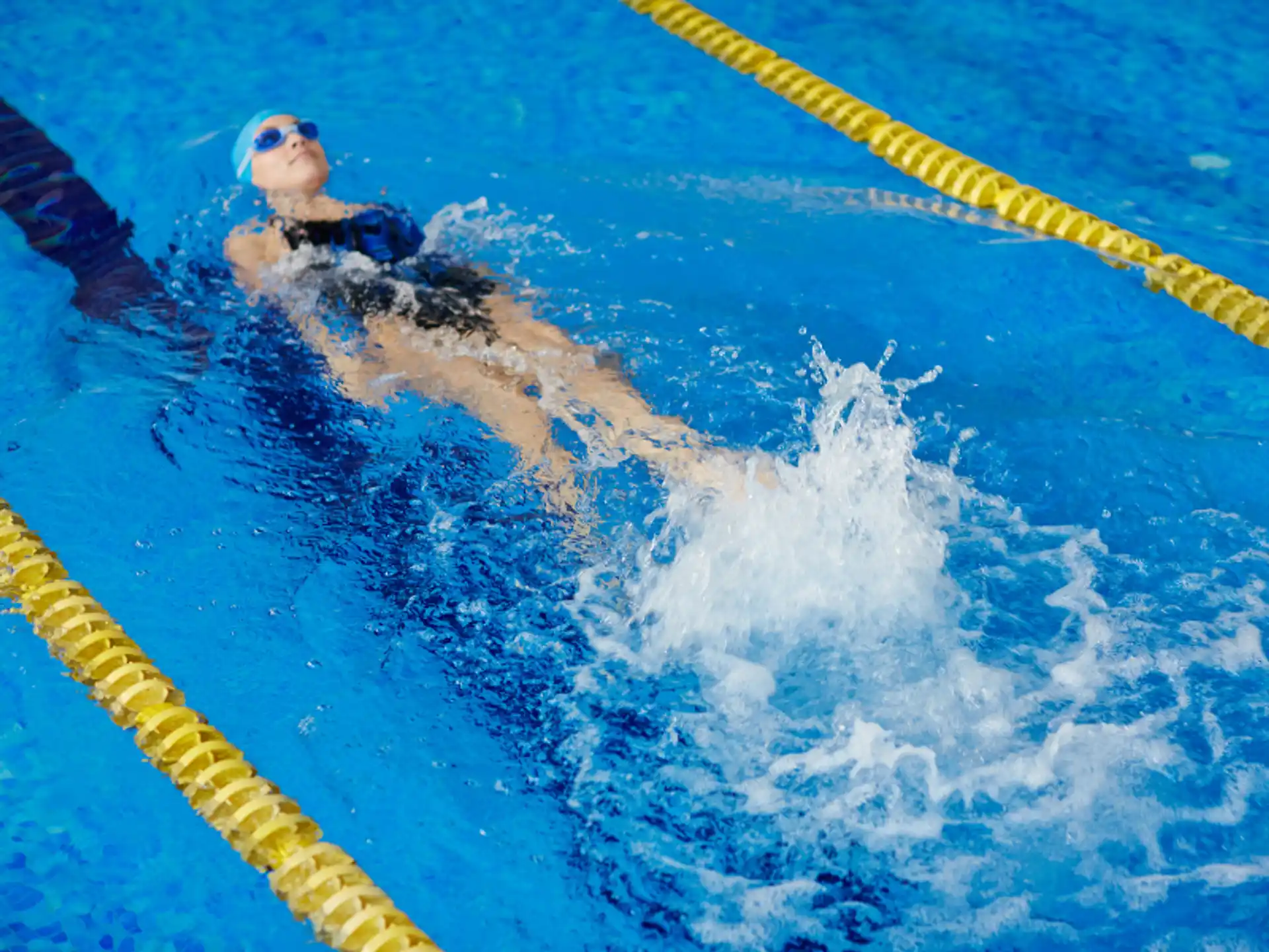 a person swimming in a pool
