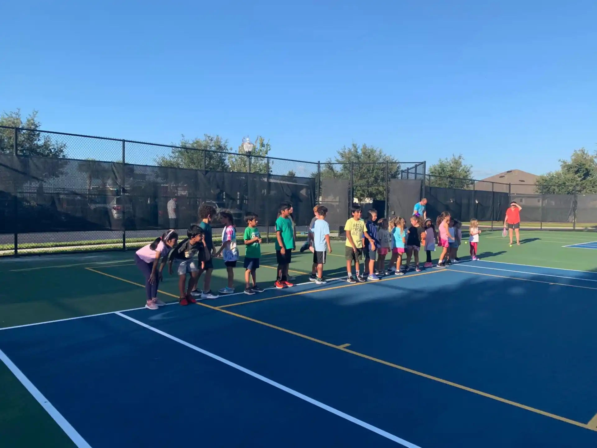a group of people standing on a track